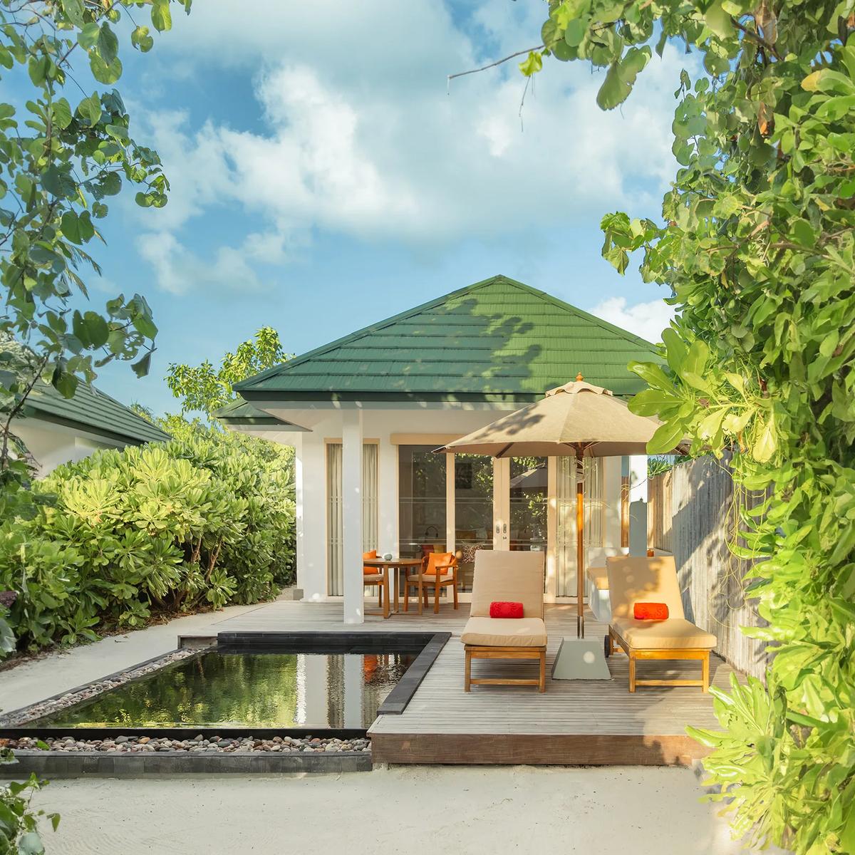 A poolside view on the sunset side of Siyam World; a dedicated photograph of Mint Beach Bar, the adults-only infinity pool bar, to follow
