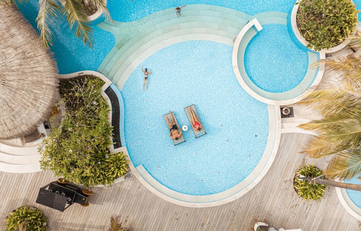 The resort's scalloped main pool seen from above — stands in for The Collective's own photography, not yet available