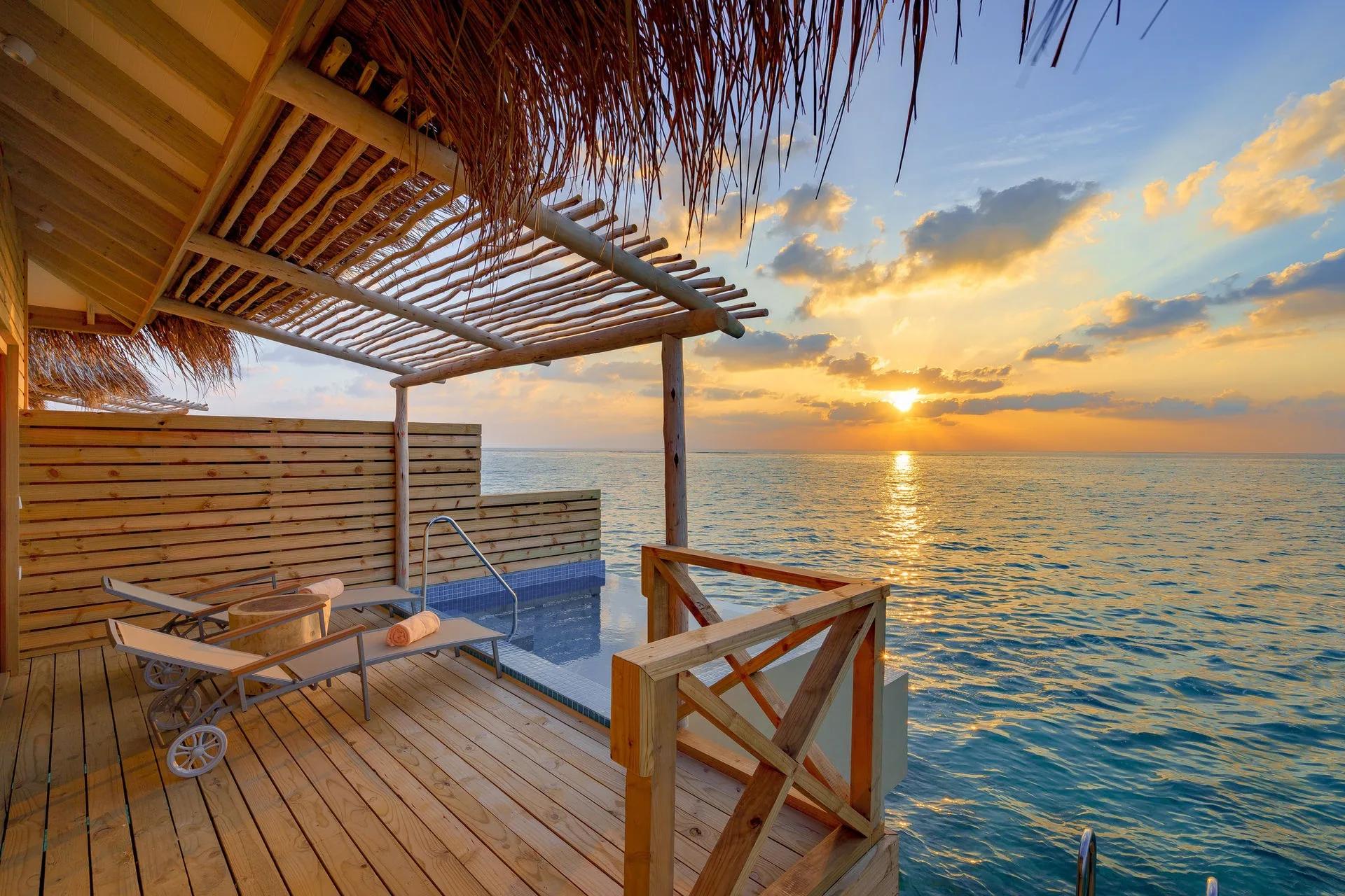 A Lagoon Suite with Pool at You & Me Maldives, an overwater suite with its own plunge pool