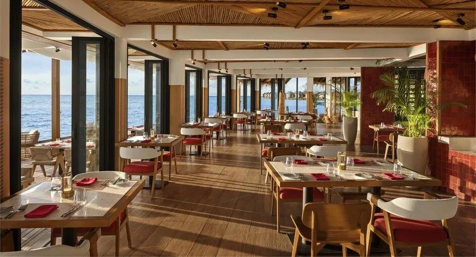 Interior seating area of Sea.Fire.Salt., Anantara Dhigu's grill restaurant