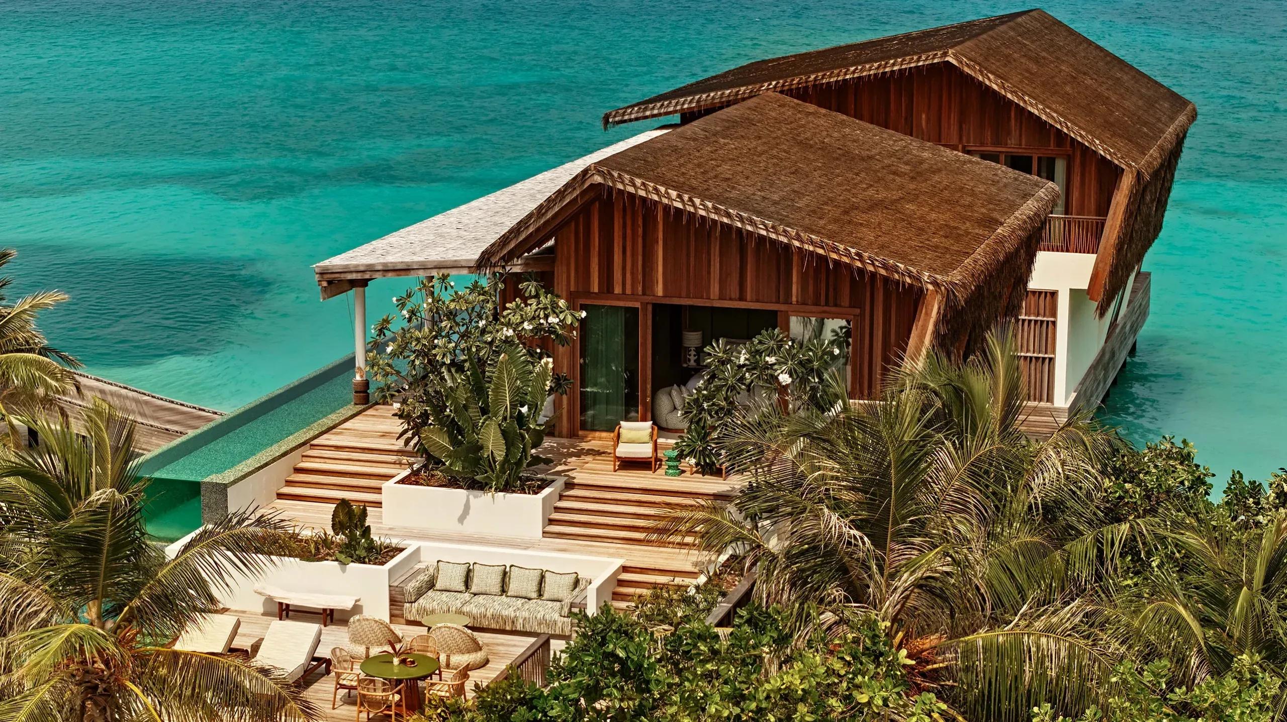 A 3-Bedroom Residence at .Here on Somewhere island, its double-aspect design facing both beach and lagoon