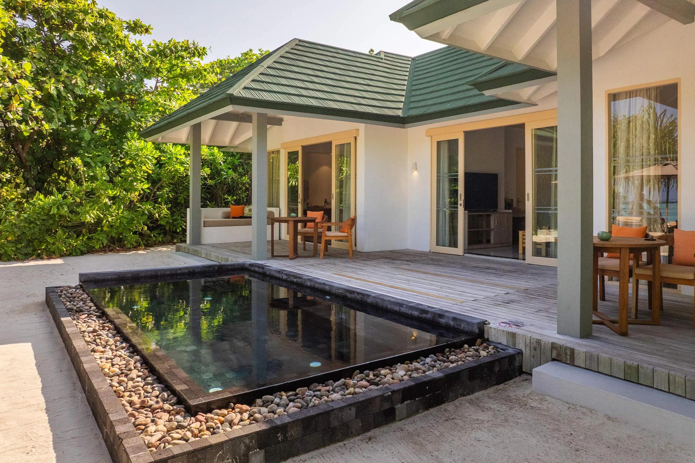 Three Bedroom Pool Beach Villa's pool and deck at Siyam World