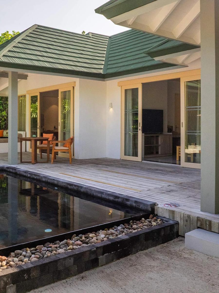 Three Bedroom Pool Beach Villa's pool and deck at Siyam World