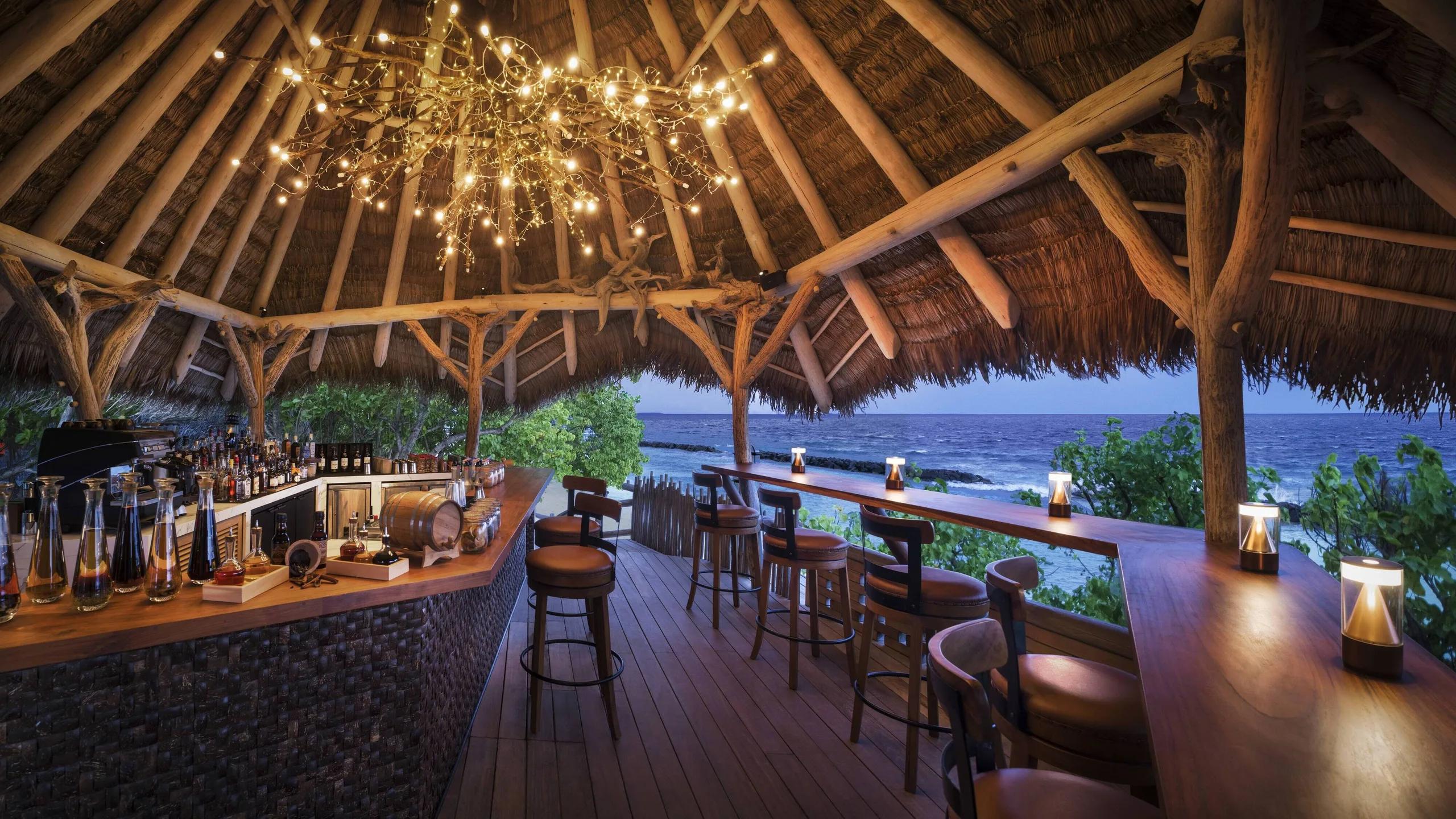 The bar at Rum Baan, reached by a rope bridge into the treetops beside Kaashi