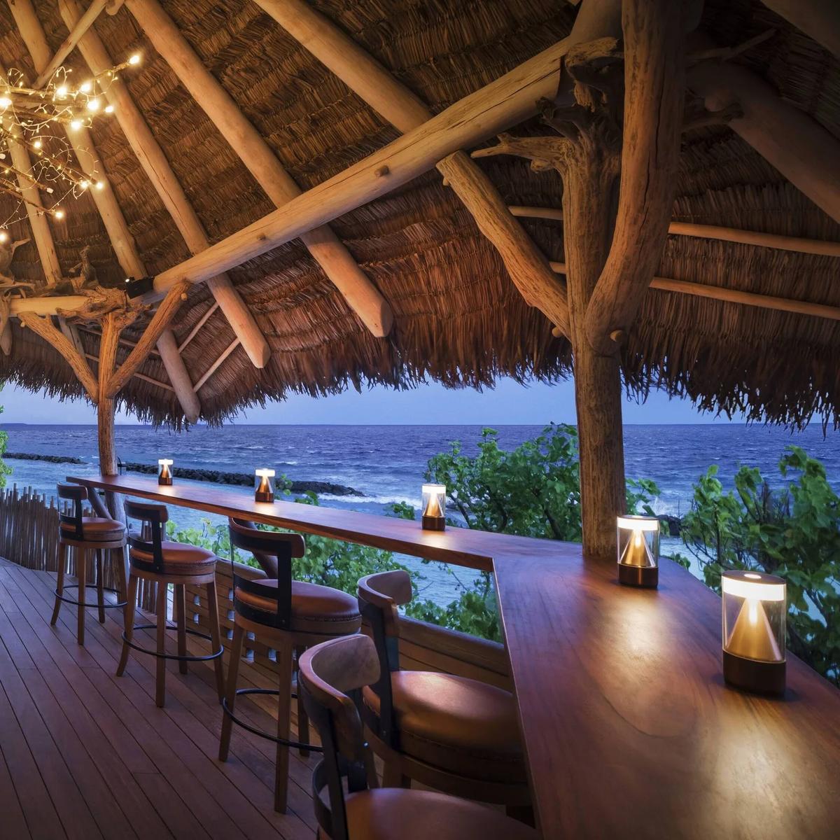 The bar at Rum Baan, reached by a rope bridge into the treetops beside Kaashi