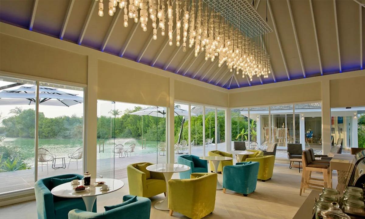 Aroma Café's lakeside seating, specialty coffee served beside the water