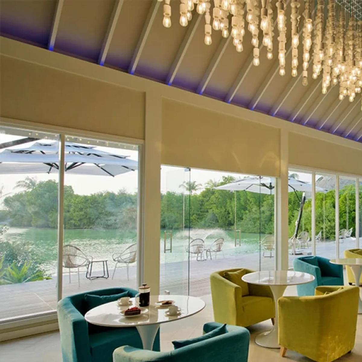 Aroma Café's lakeside seating, specialty coffee served beside the water