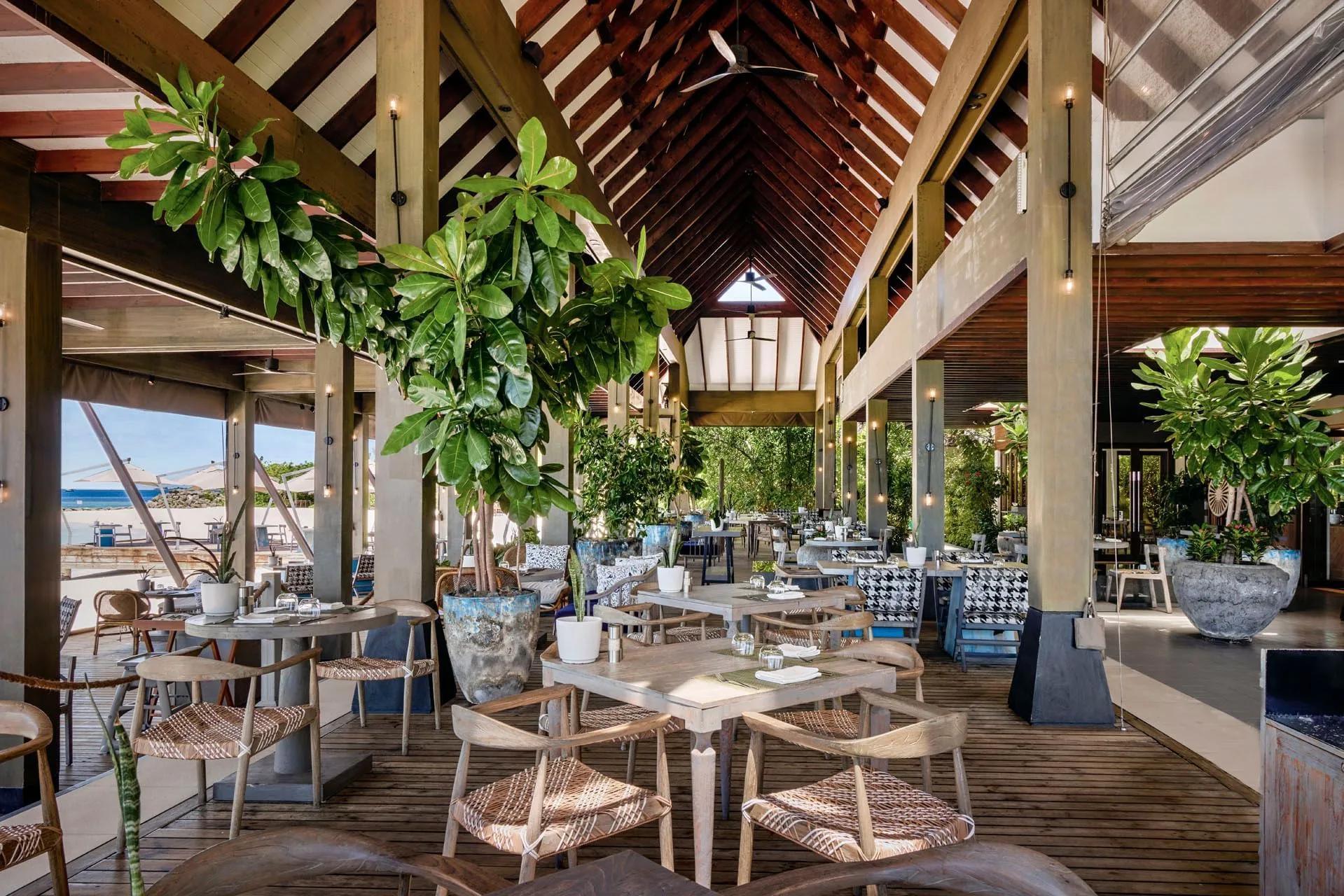 The open-air, pine-wood dining room at The Edge