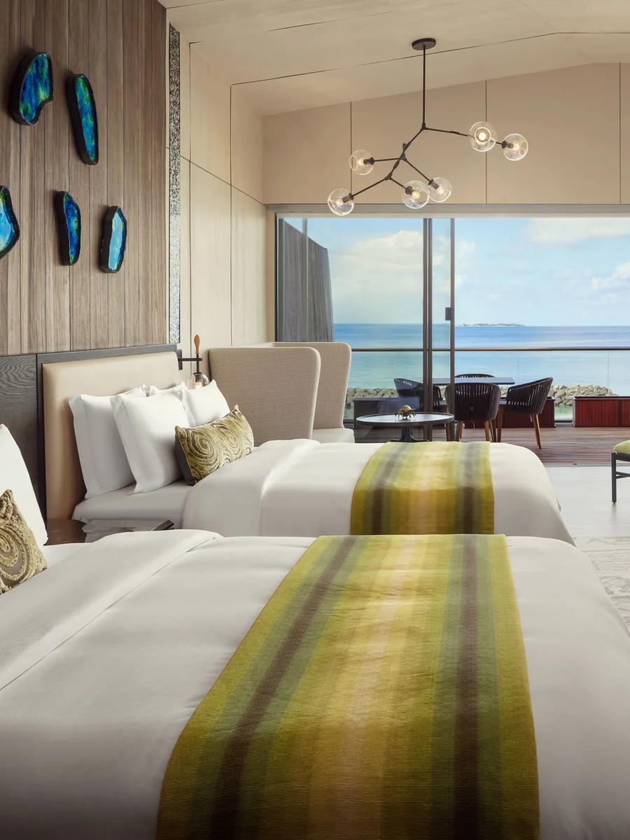 The bedroom of a Two Bedroom Sunset Villa at The St. Regis Maldives Vommuli Resort