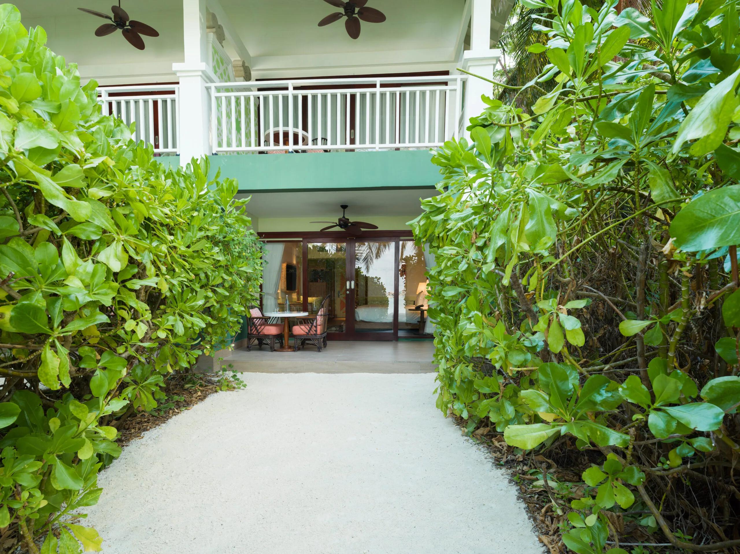 Exterior of a Beach Room at SAii Lagoon Maldives, opening directly onto the beach
