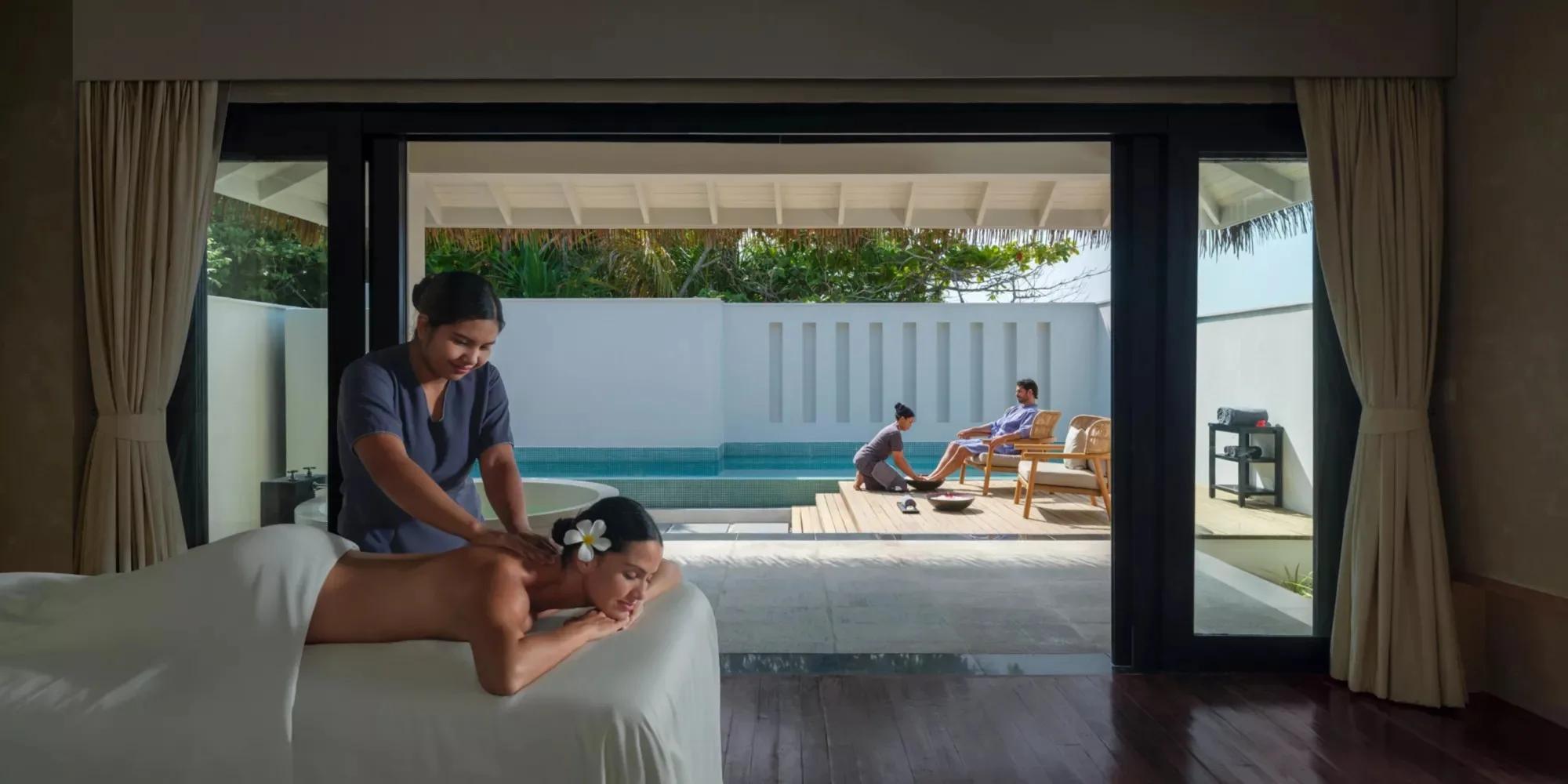 A treatment underway at Funa Spa, Noku Maldives, its terrace opening onto a private pool