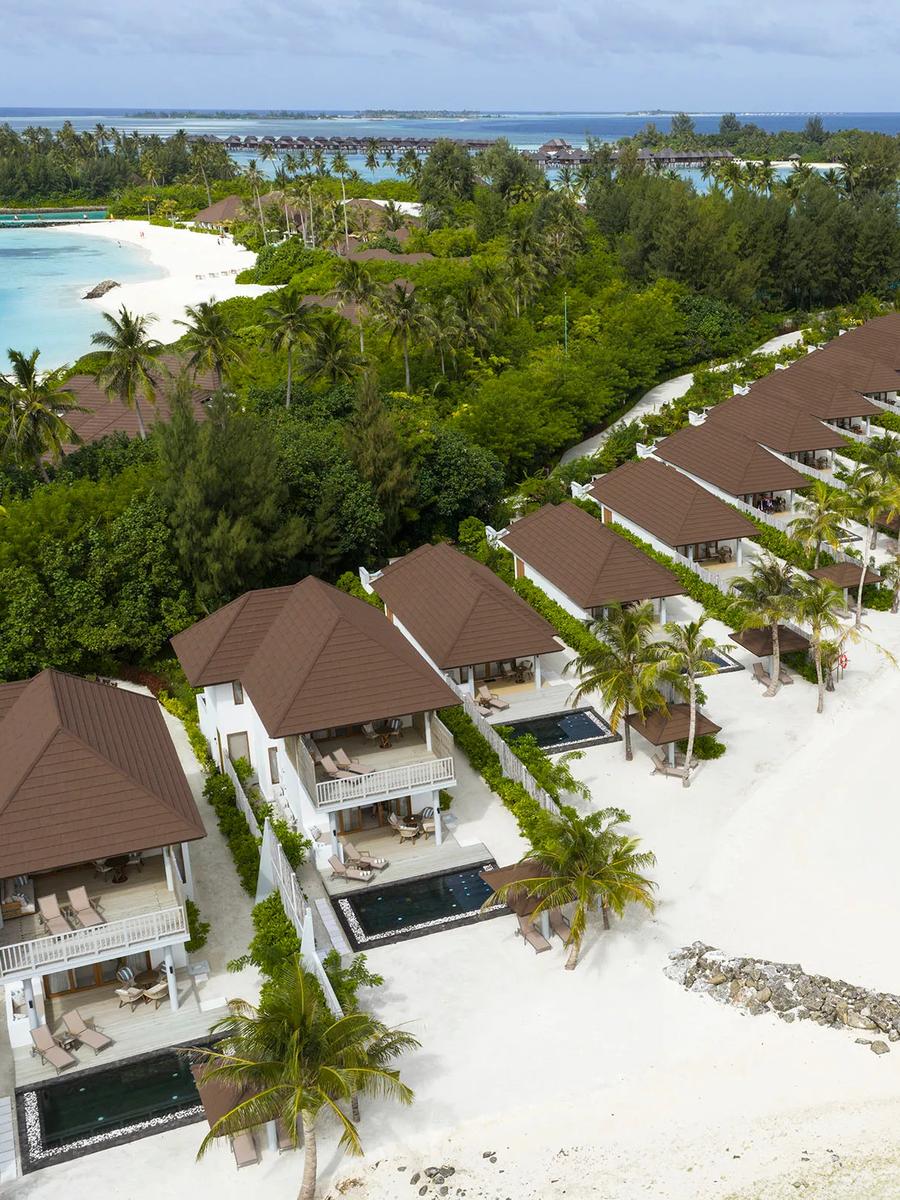 Interior and exterior view of a Two Bedroom Beach Residence at Sun Siyam Olhuveli, Dream Island