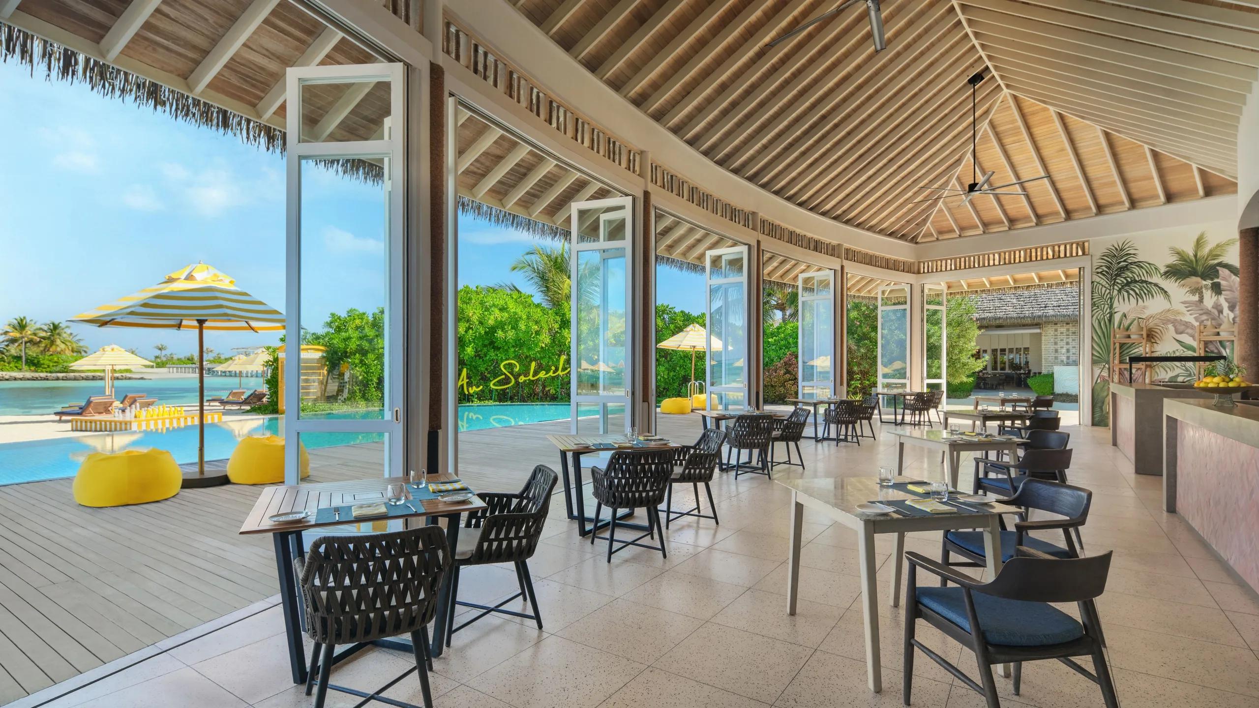 Velaa Bar + Grill's indoor seating with ocean views