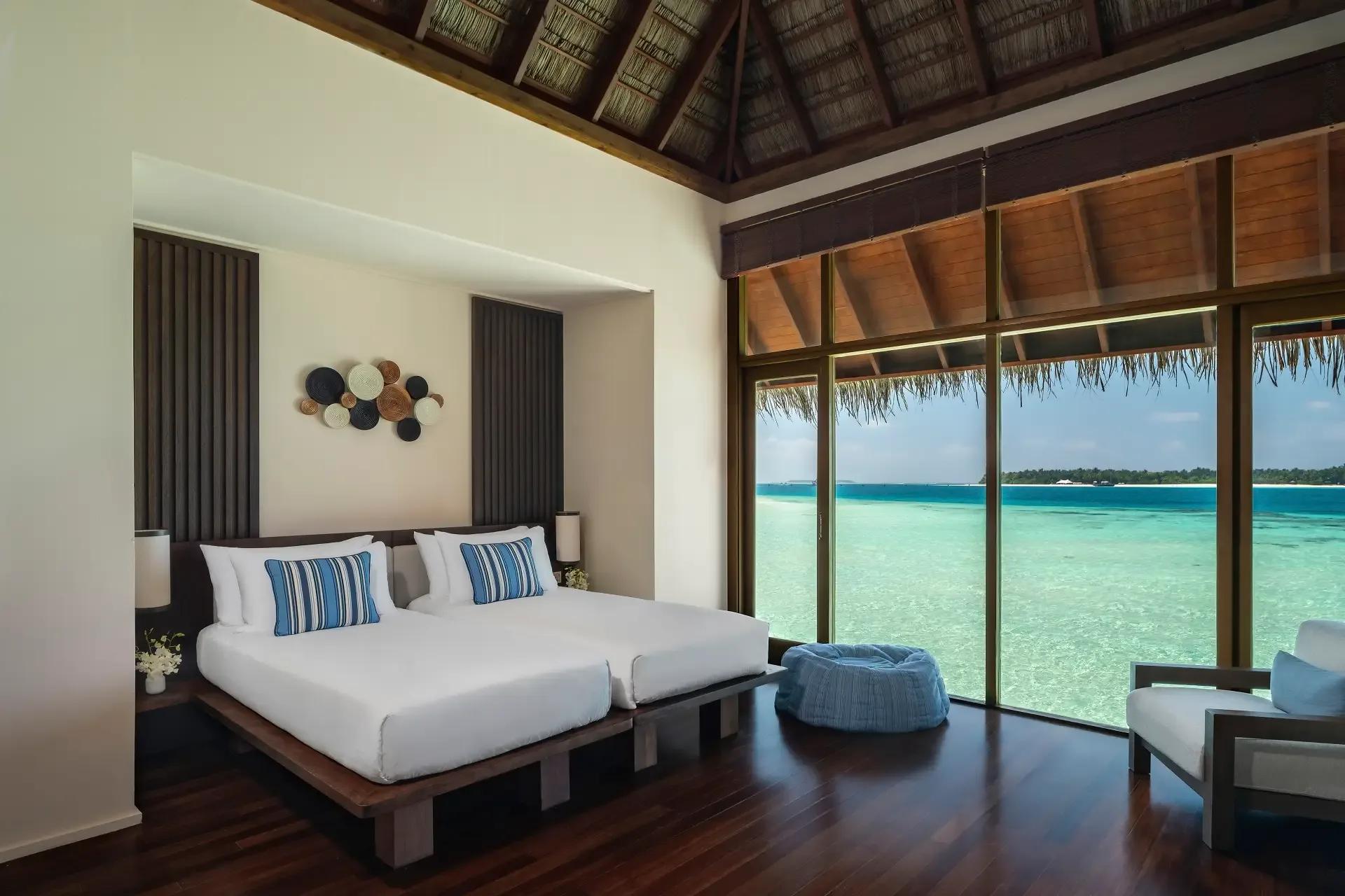 The second bedroom of a Two-Bedroom Grand Water Villa at Conrad Maldives Rangali, overlooking the lagoon