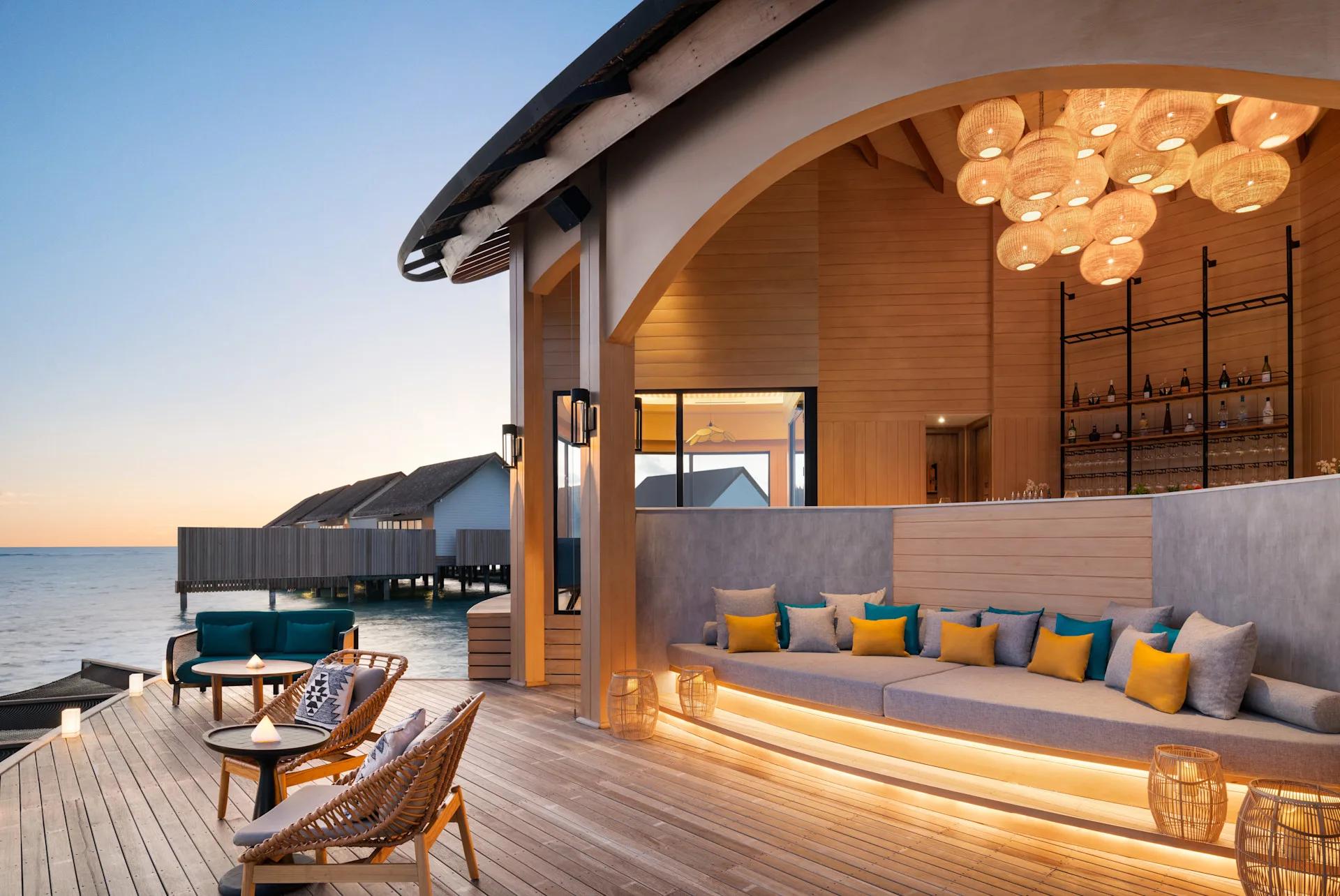 The overwater seating area at Eden Champagne & Gin Bar