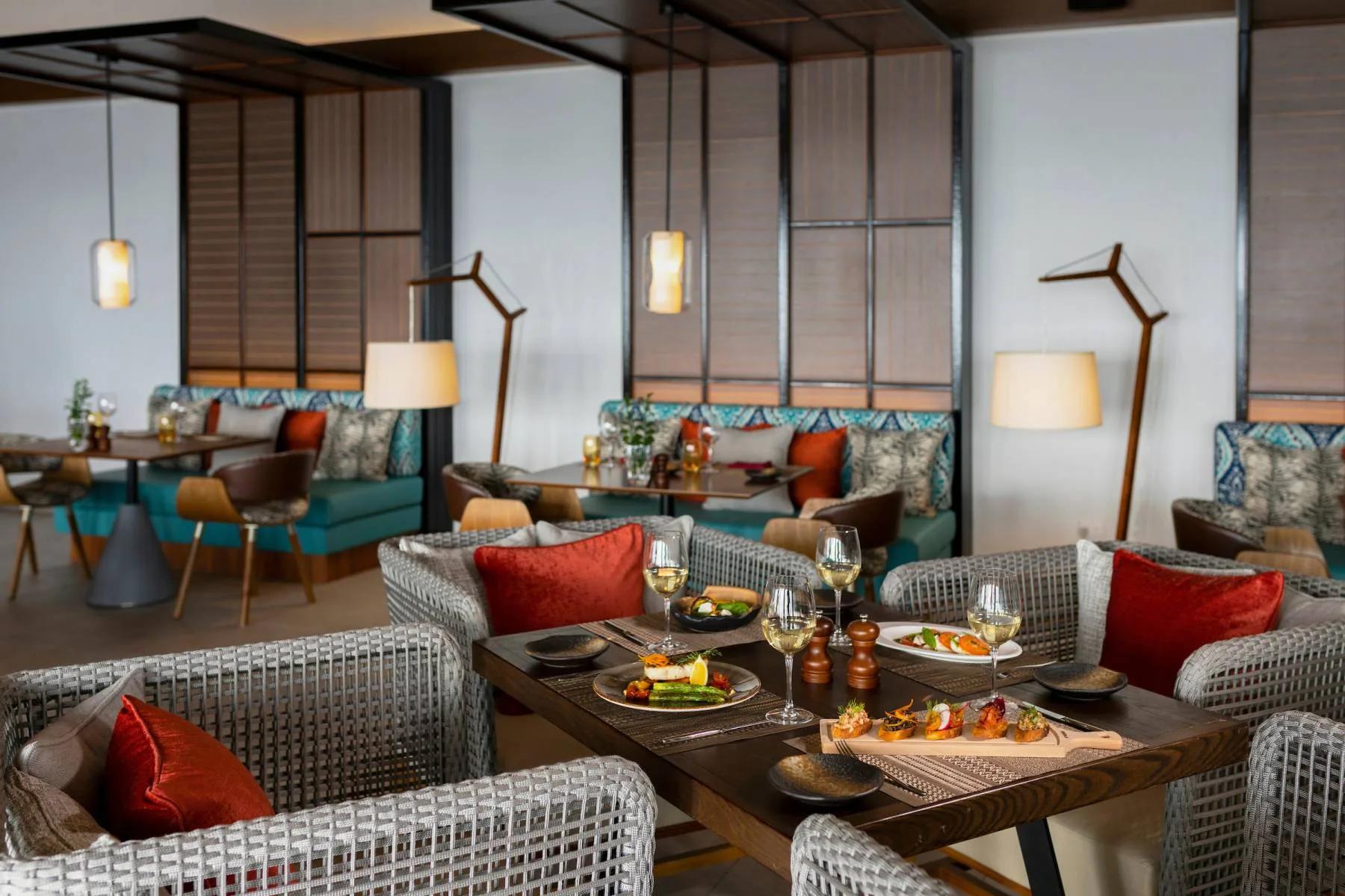 The overwater dining terrace at Souq Oven