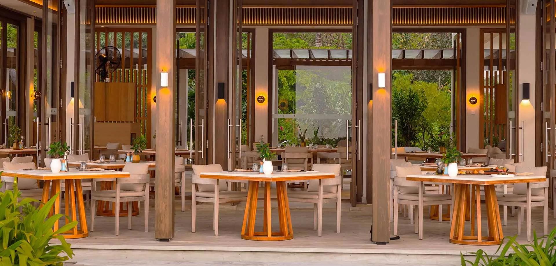 Fire, the American steakhouse at Kuda Villingili Resort Maldives, set for dinner service