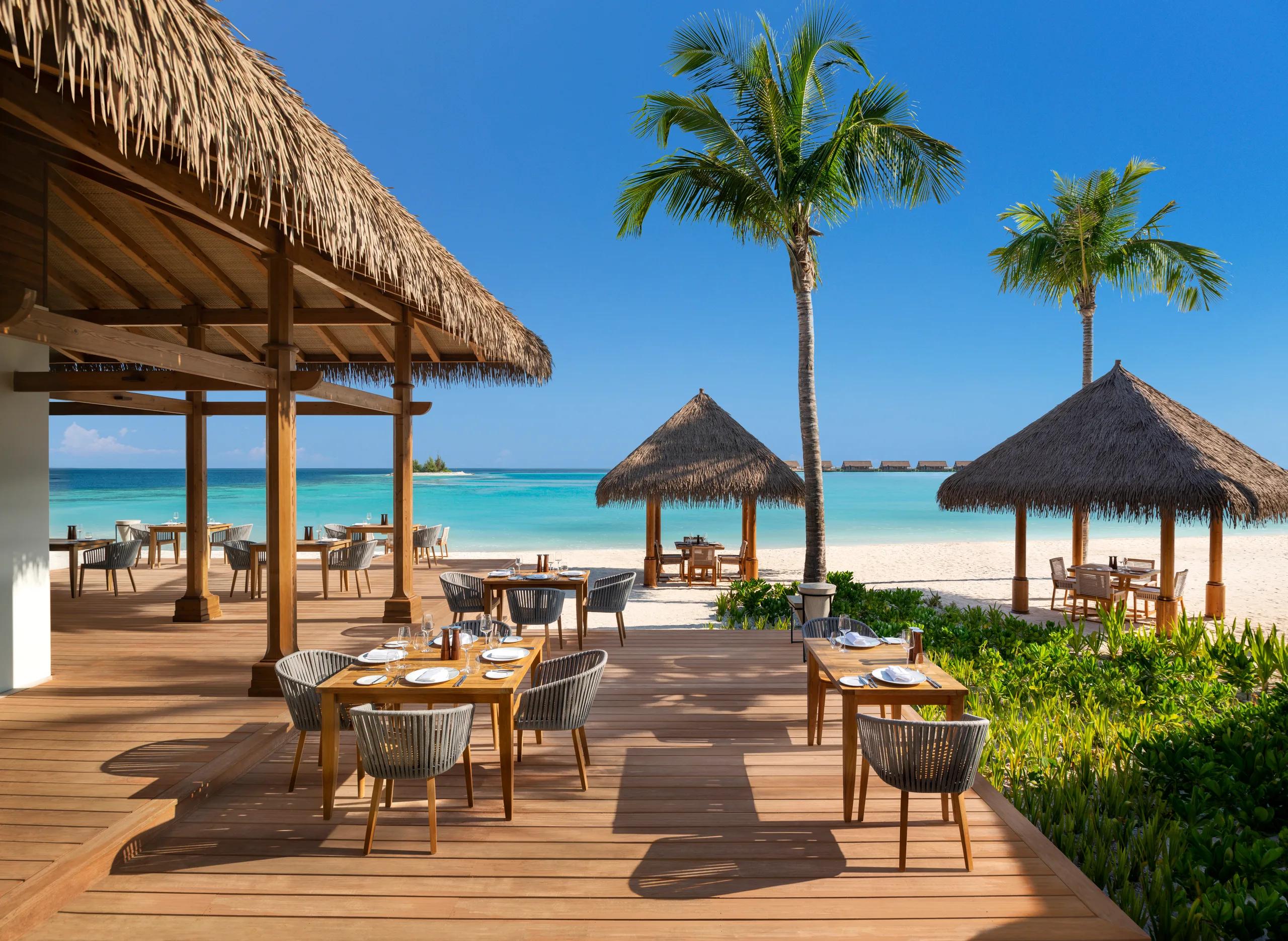The beachfront dining room at Tasting Table, Waldorf Astoria Maldives Ithaafushi's all-day restaurant