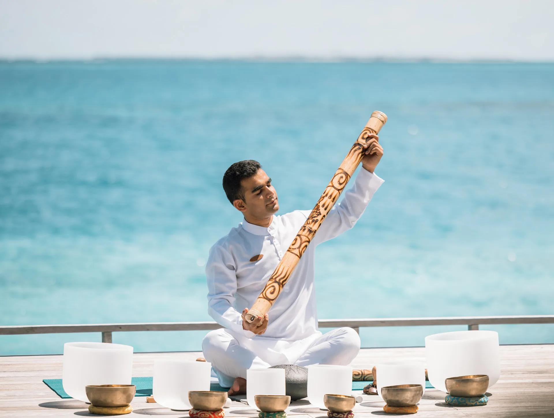 A sound-healing session on the Skye Deck — the official site has no separate food-and-drink photography for this venue, so this spa-context image stands in