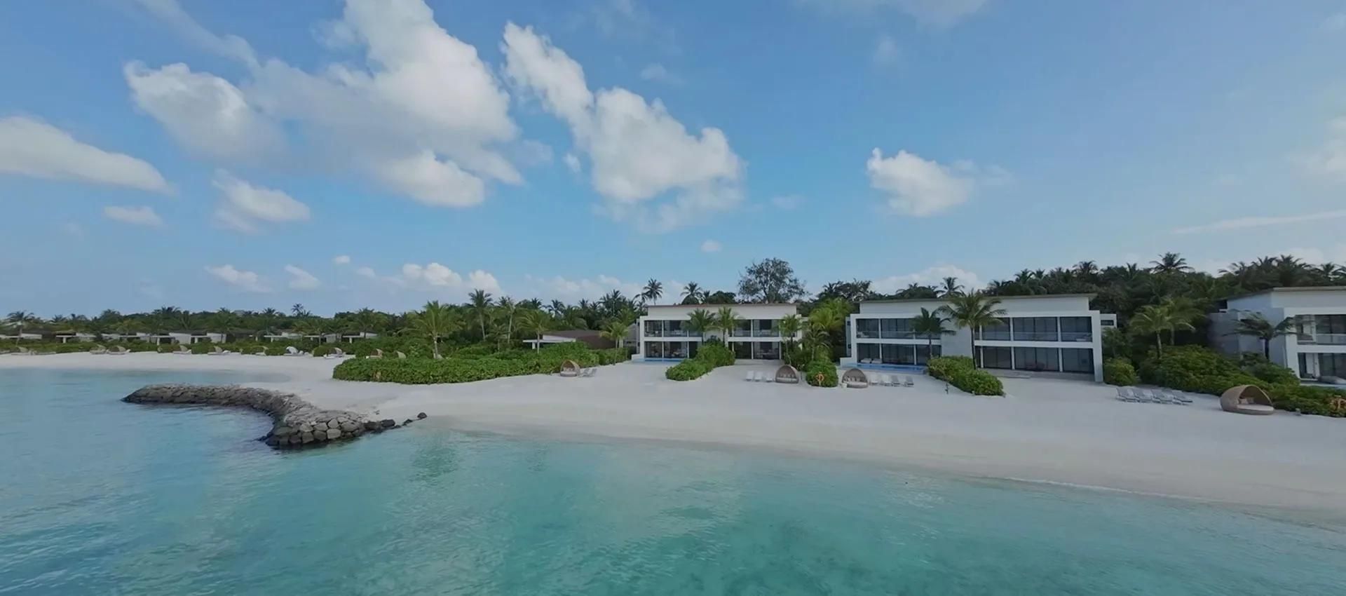 The exterior and private pool of a Four Bedroom Beach Villa at Kuda Villingili