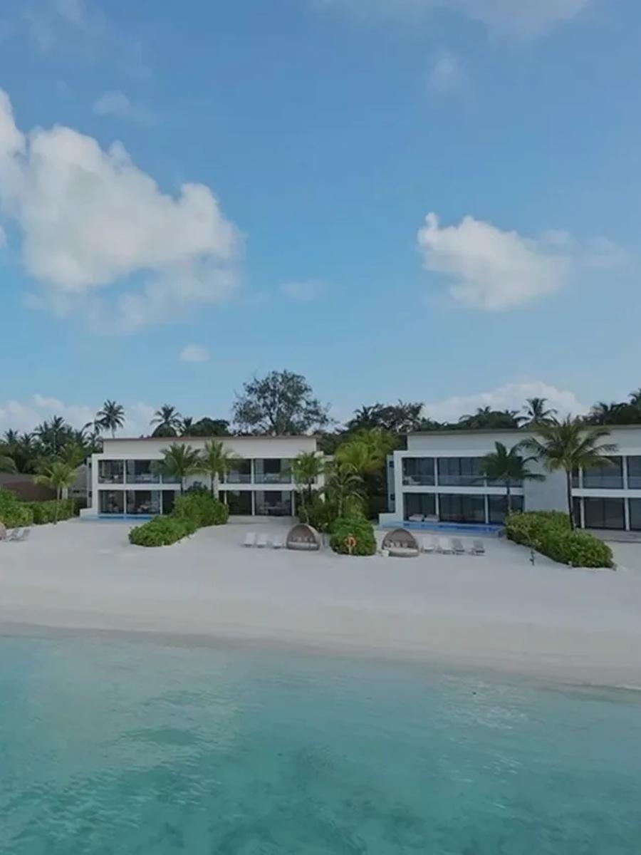 The exterior and private pool of a Four Bedroom Beach Villa at Kuda Villingili