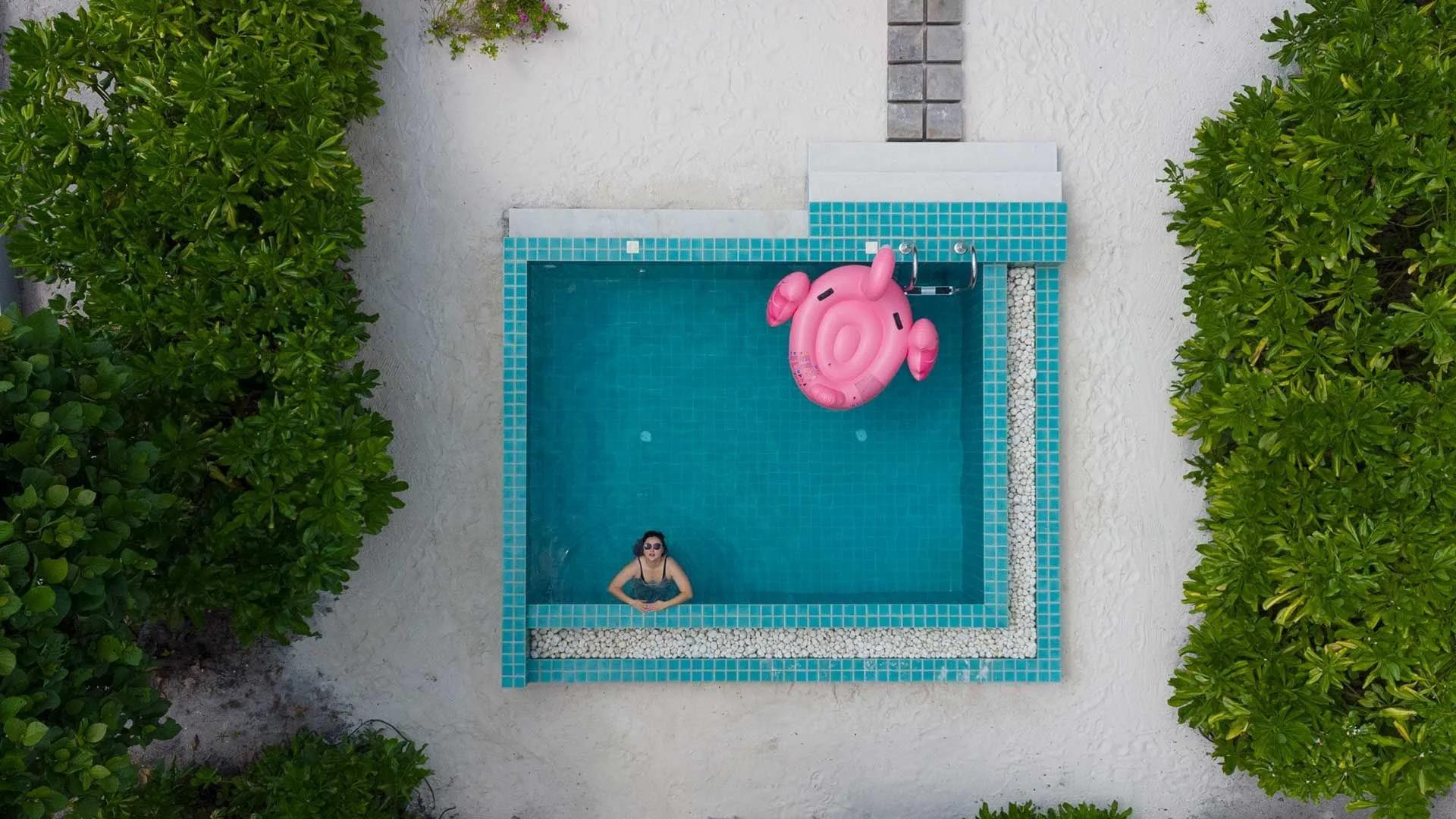 An aerial view of a Sunset Beach Villa with Pool at Ifuru Island Maldives
