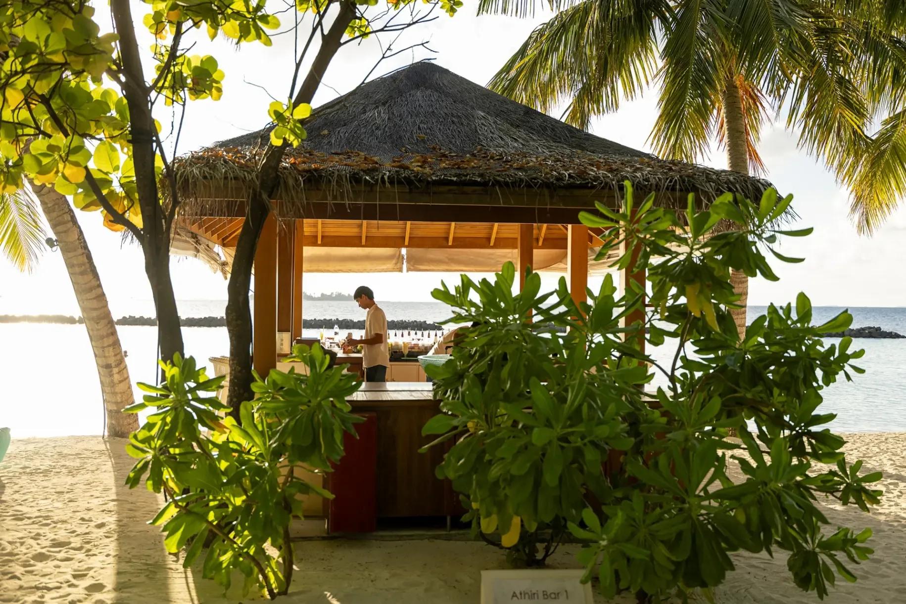 Athiri, the ankle-deep-in-water beach bar at Niva Kurumba, at dusk