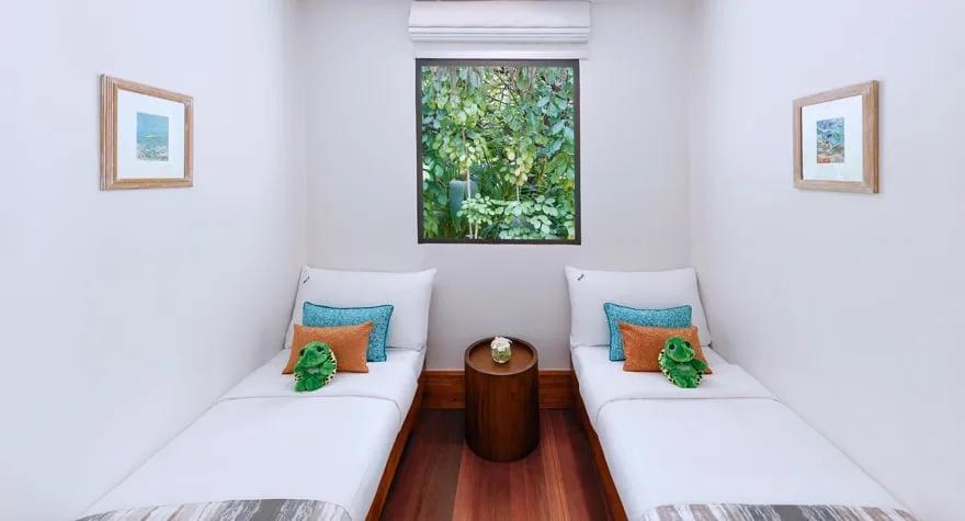 Interior of a One Bedroom Family Beach Pool Villa's kids' room at Anantara Kihavah