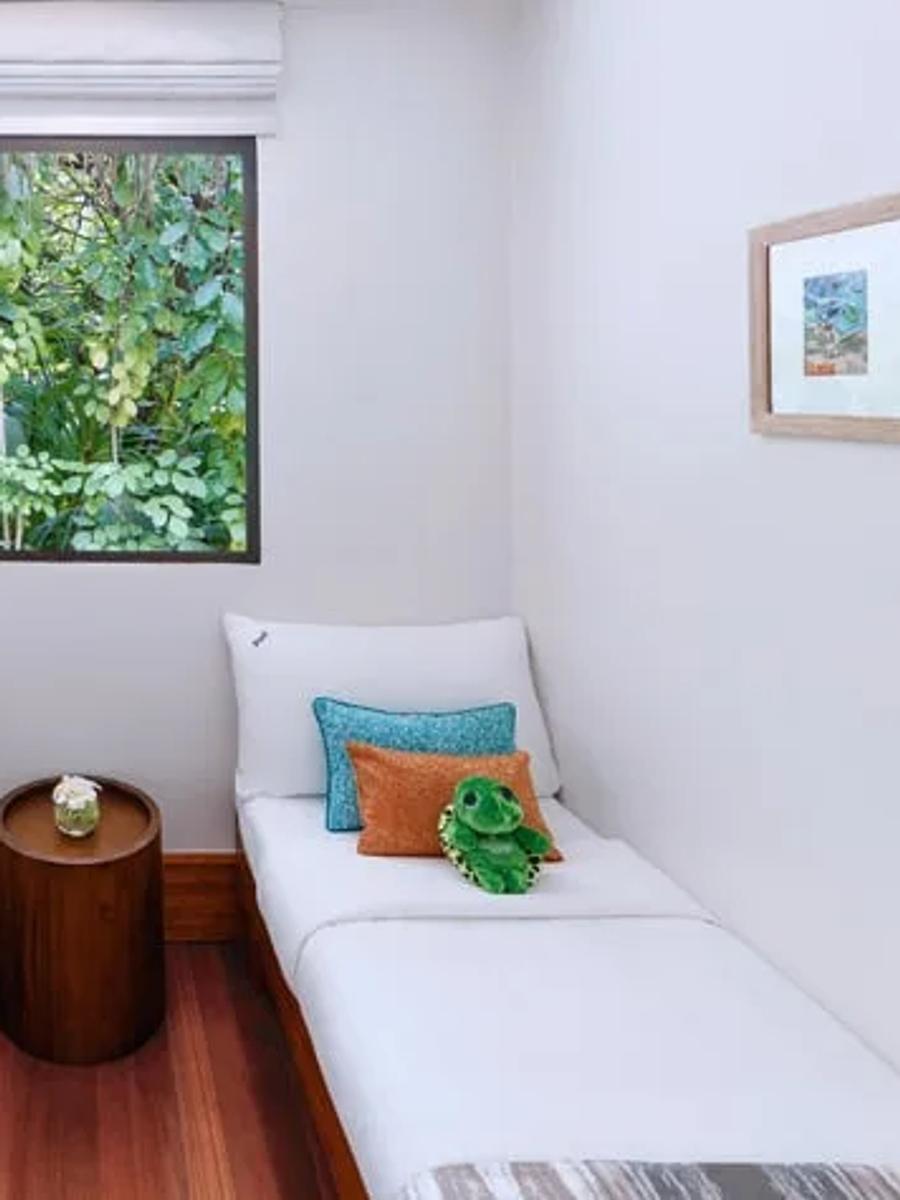 Interior of a One Bedroom Family Beach Pool Villa's kids' room at Anantara Kihavah