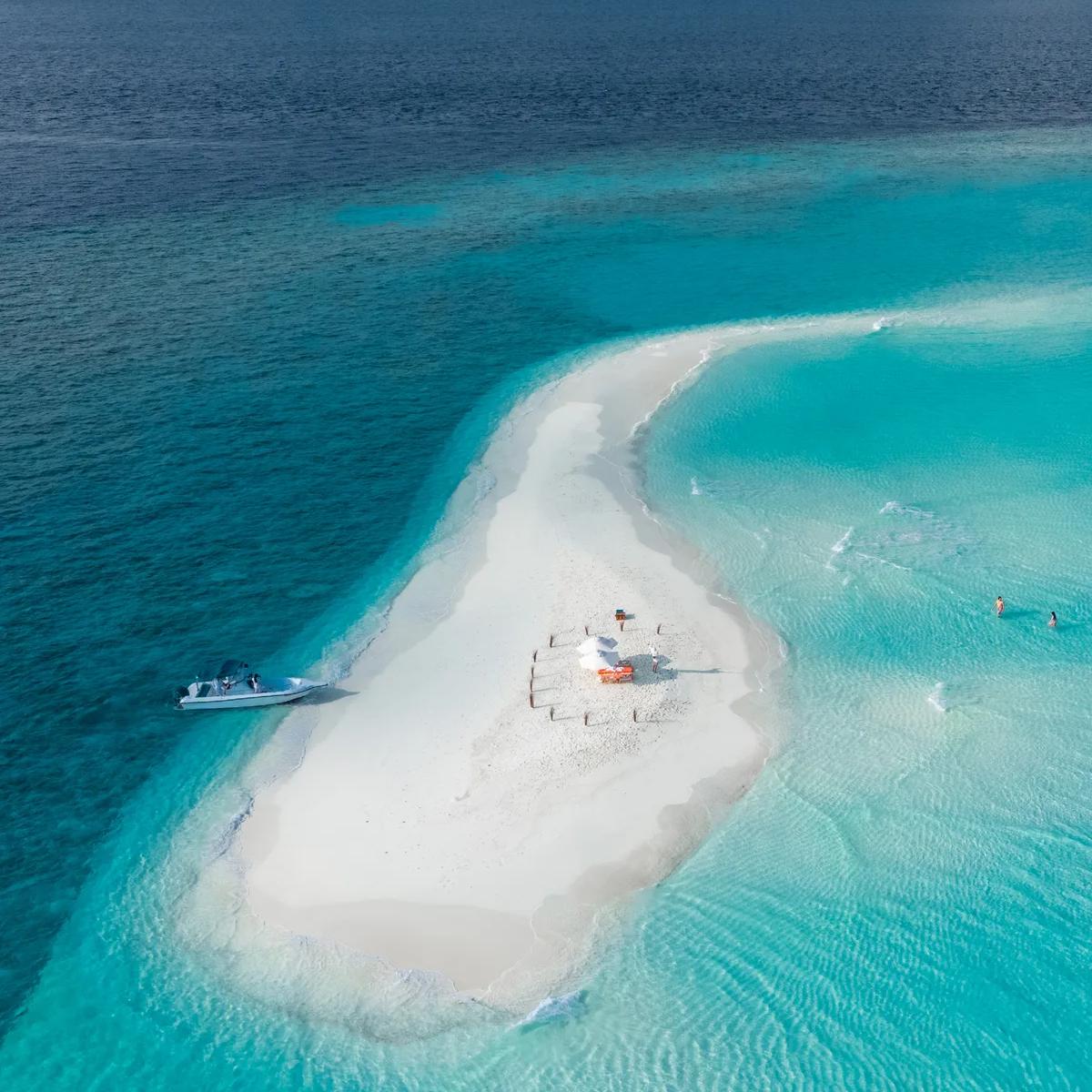 A castaway picnic set up on a sandbank near Soneva Fushi — representative image; a dedicated photograph of the Chocolate, Cheese and Ice Cream Rooms wasn't available in this research batch