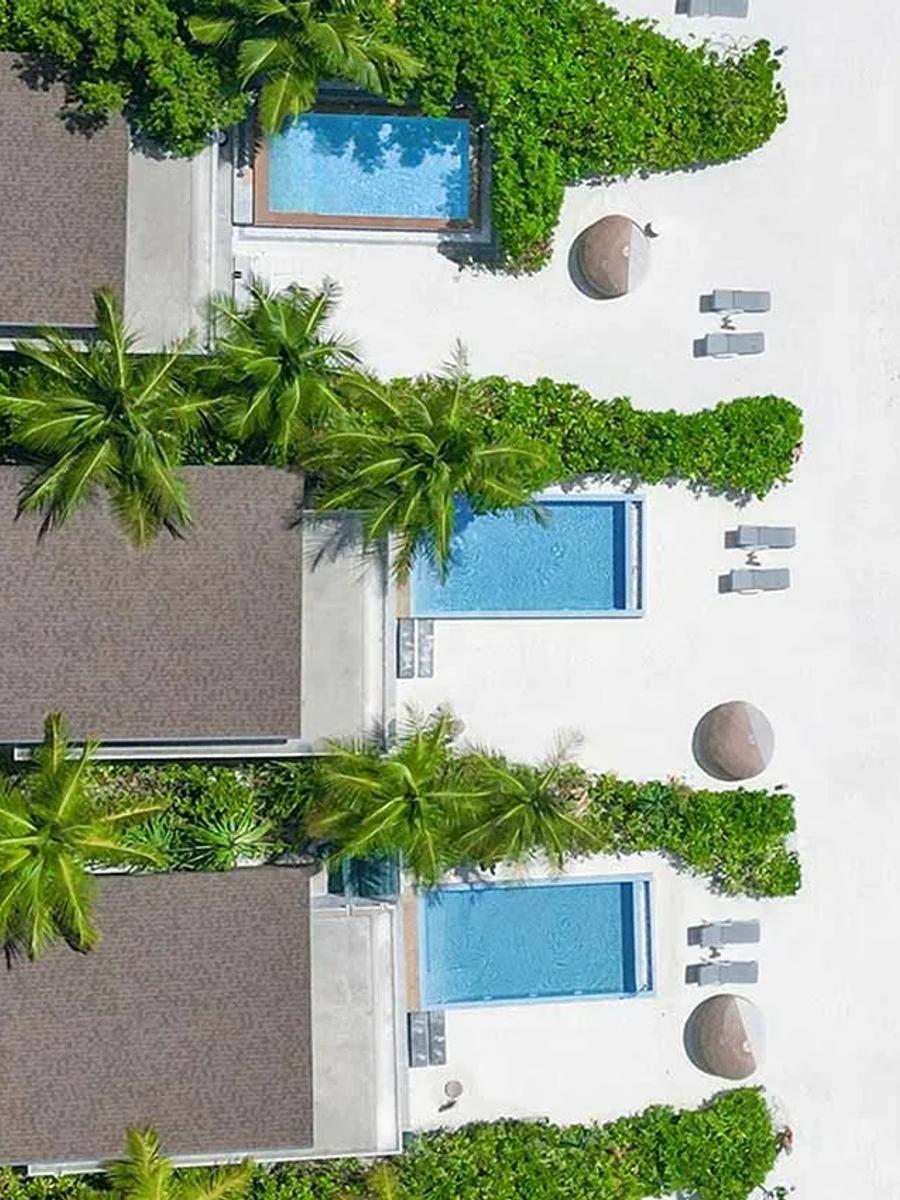 The Sunrise Beach Villa's private pool and terrace, steps from the sand