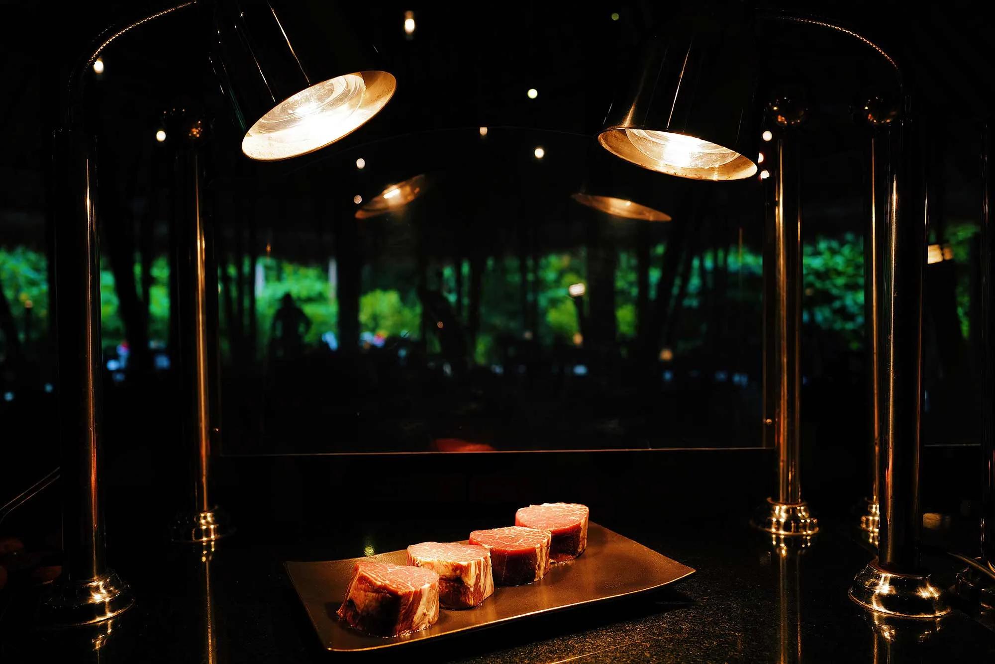 Carnivorous Restaurant's dining room, set for the evening