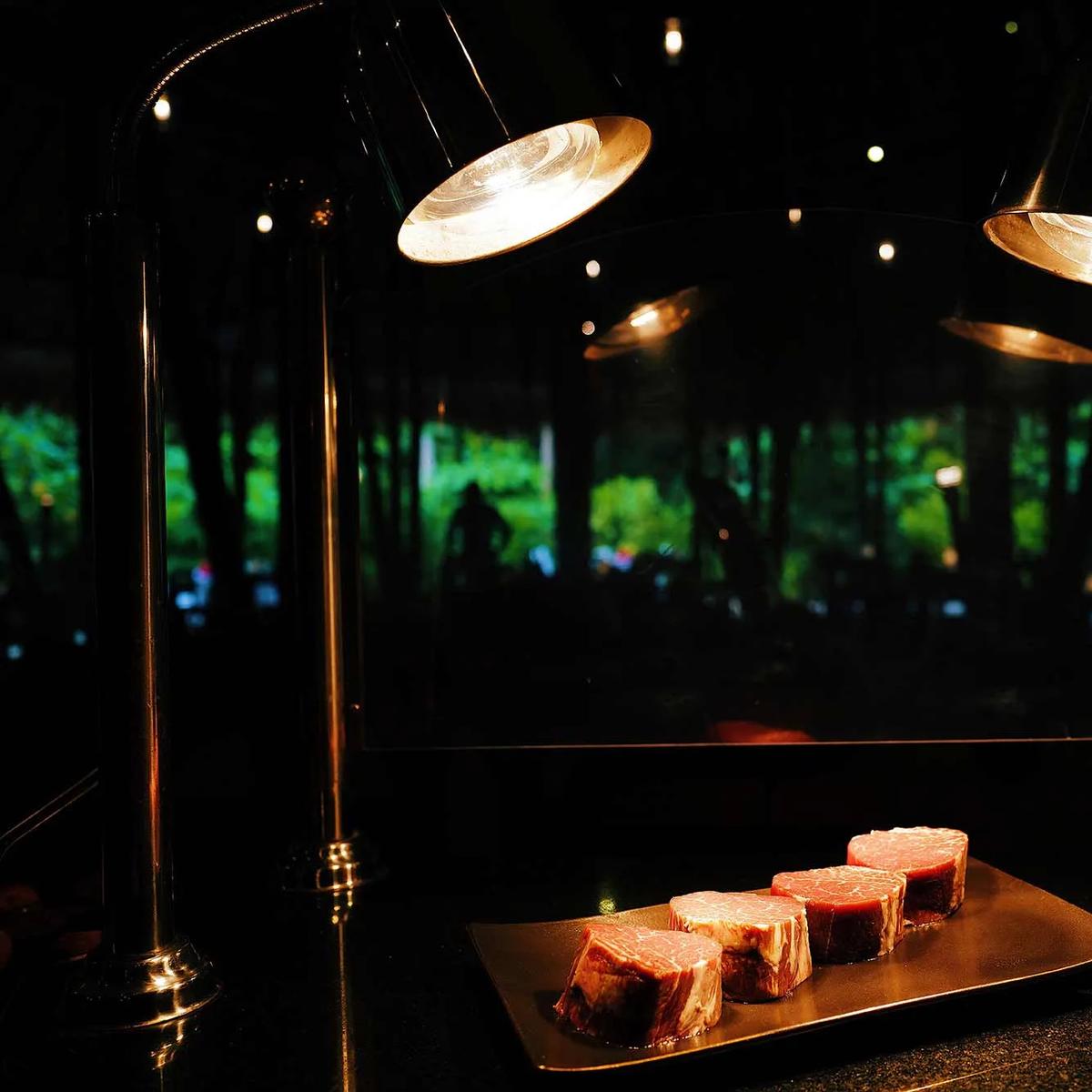 Carnivorous Restaurant's dining room, set for the evening