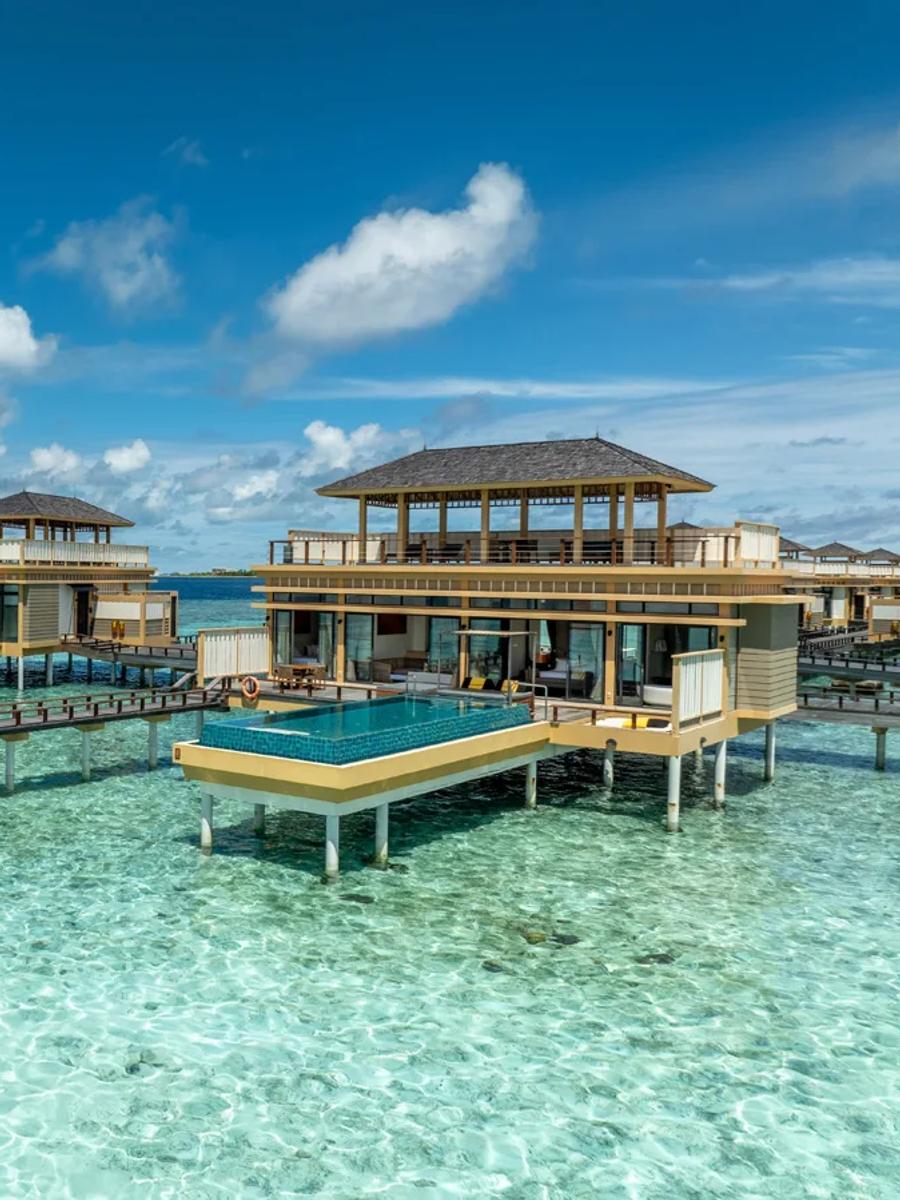 Exterior of the Deluxe In-Ocean Two Bedroom Pool Villa, a two-storey residence over the reef at Angsana Velavaru