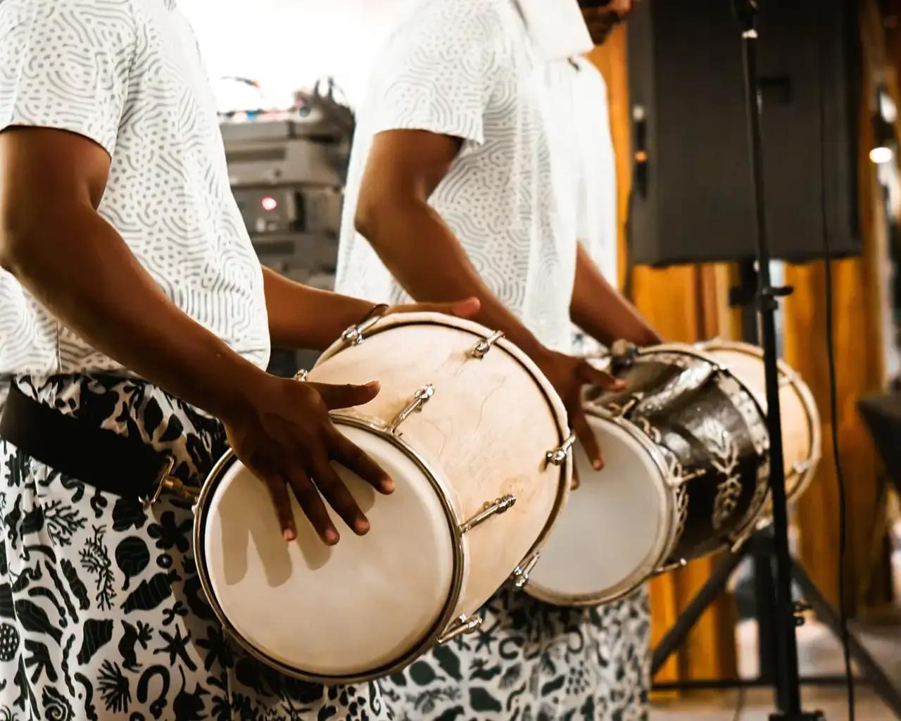 Musicians playing traditional Boduberu drums as part of Meyyafushi's evening entertainment