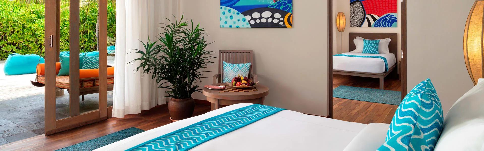 Master bedroom of a Two Bedroom Family Pool Villa at Anantara Dhigu