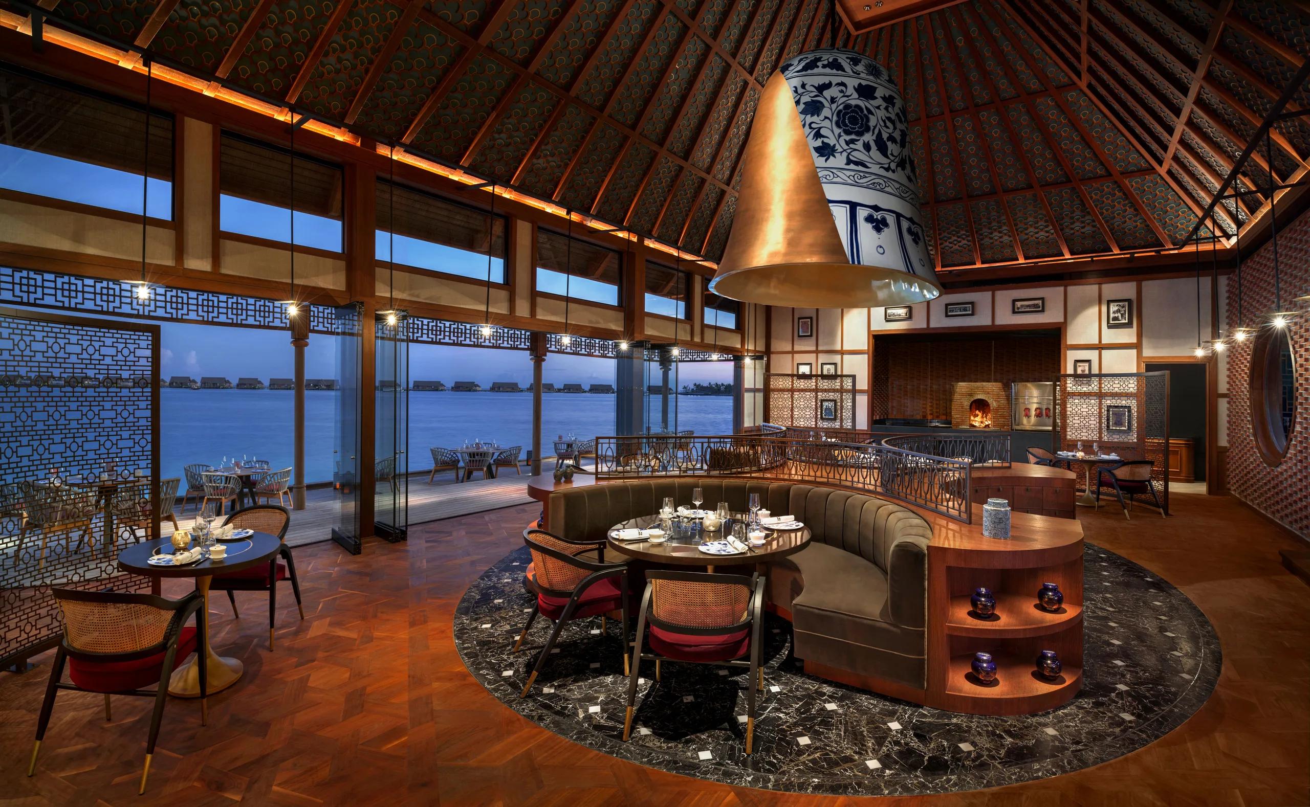 The interior of Li Long, Waldorf Astoria Maldives Ithaafushi's Chinese restaurant — Zuma Maldives has no dedicated published photo, so this interior from the resort's other Asian dining venue stands in here