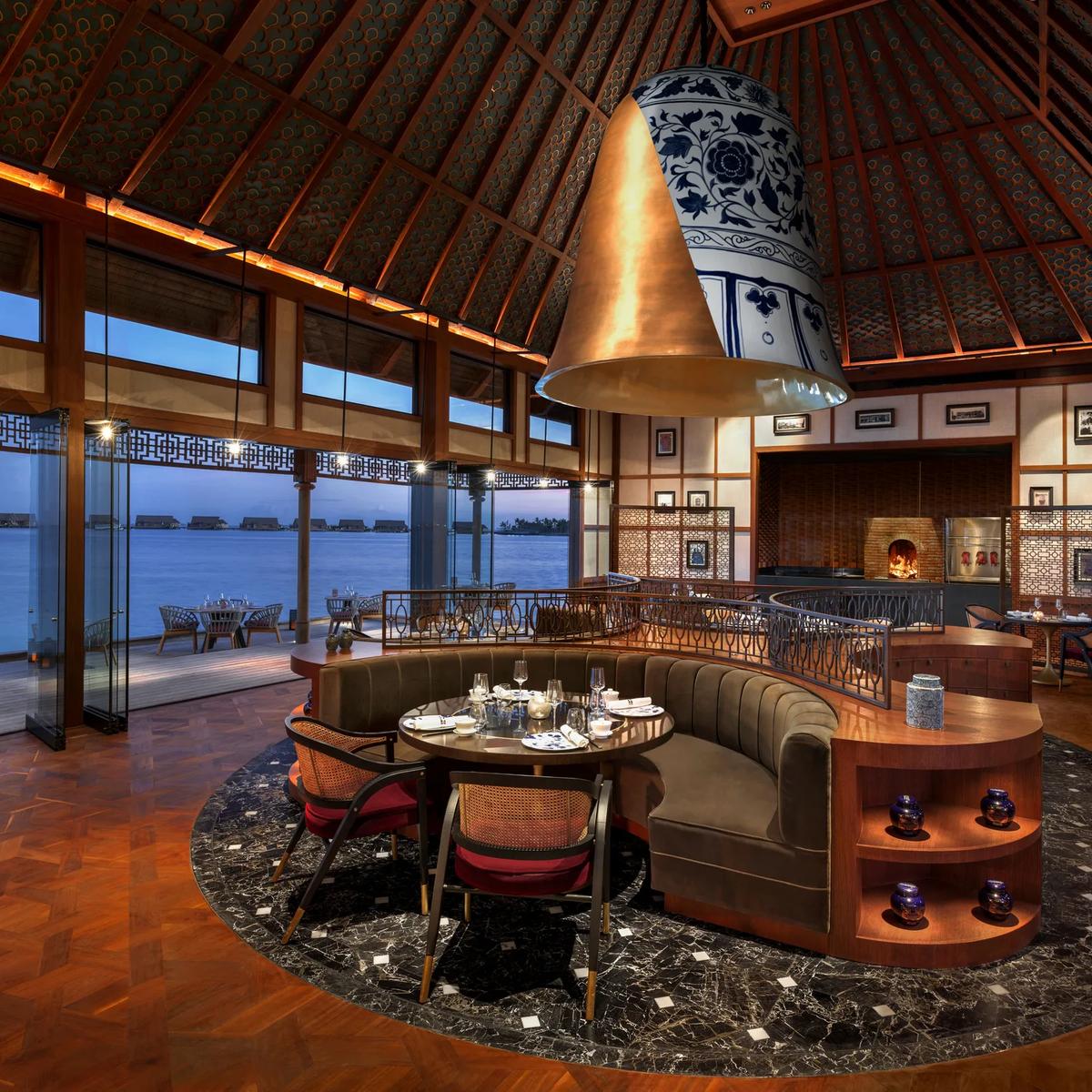 The interior of Li Long, Waldorf Astoria Maldives Ithaafushi's Chinese restaurant — Zuma Maldives has no dedicated published photo, so this interior from the resort's other Asian dining venue stands in here