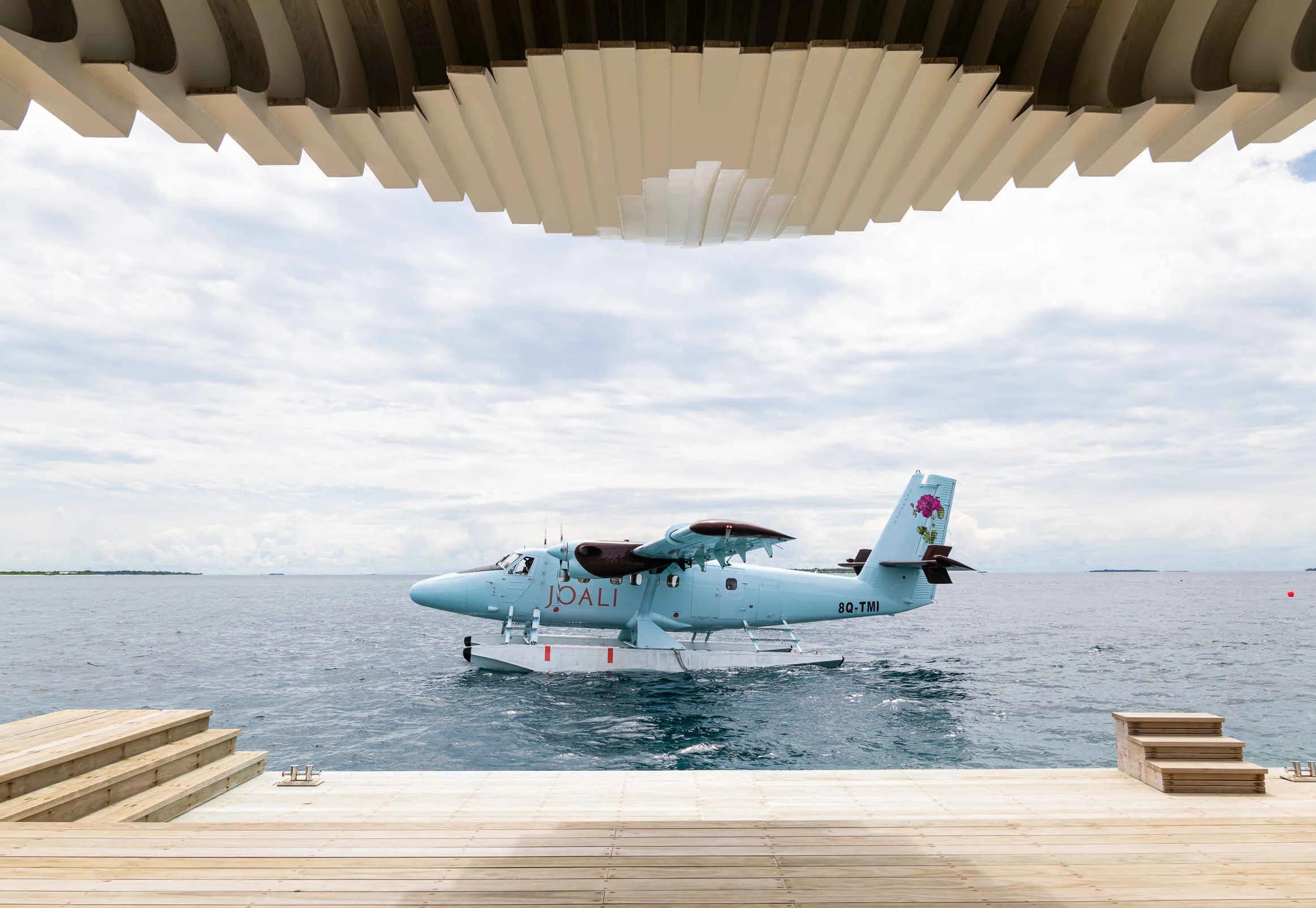 A JOALI seaplane moored beside the arrival jetty at Joali Being, Bodufushi Island, Raa Atoll