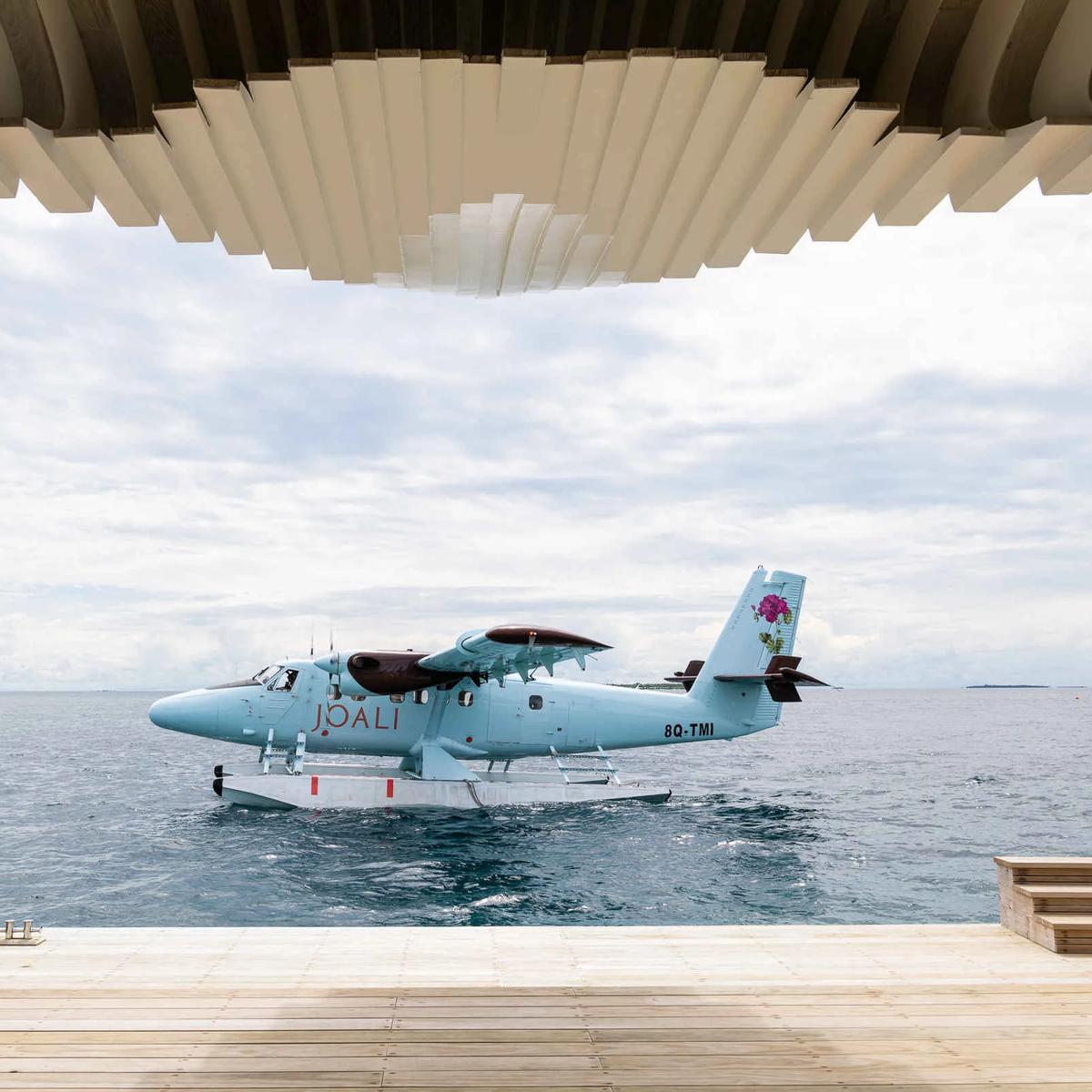 A JOALI seaplane moored beside the arrival jetty at Joali Being, Bodufushi Island, Raa Atoll