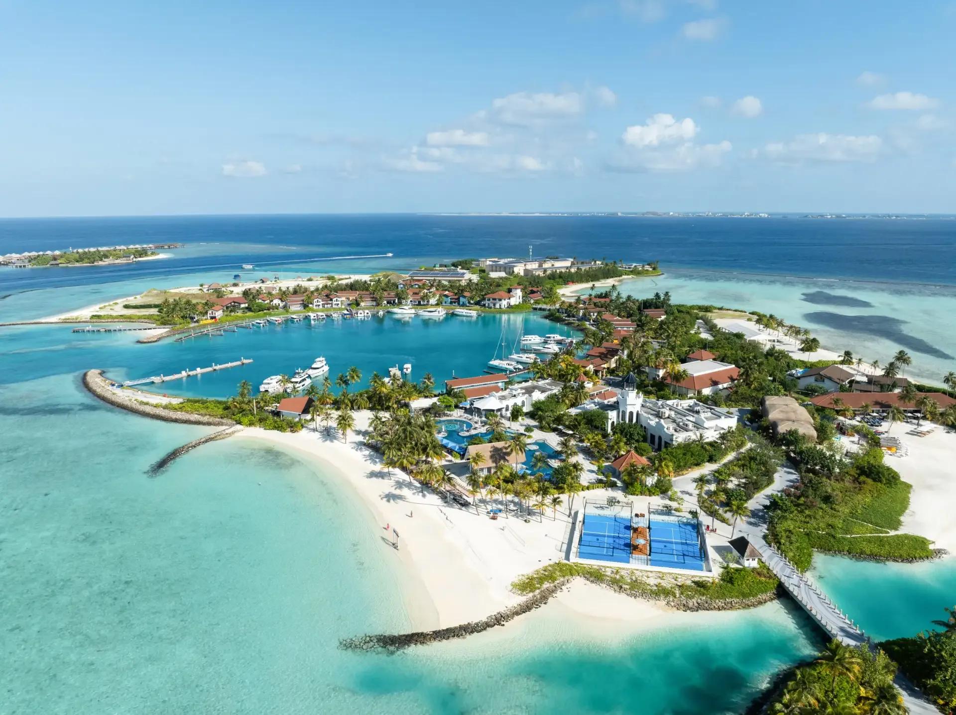 Aerial view of SAii Lagoon Maldives and the connected Crossroads Maldives island group