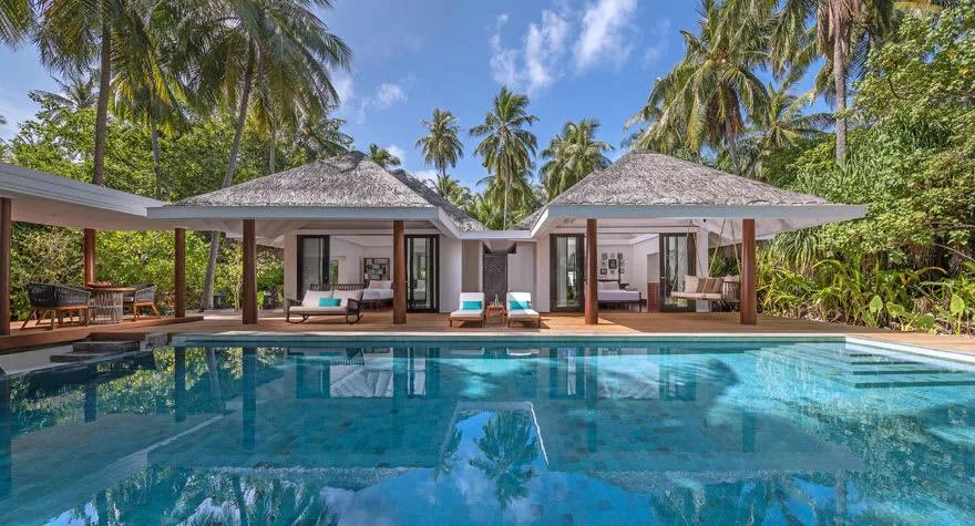 Exterior of a Two Bedroom Family Beach Pool Villa at Anantara Kihavah in daylight