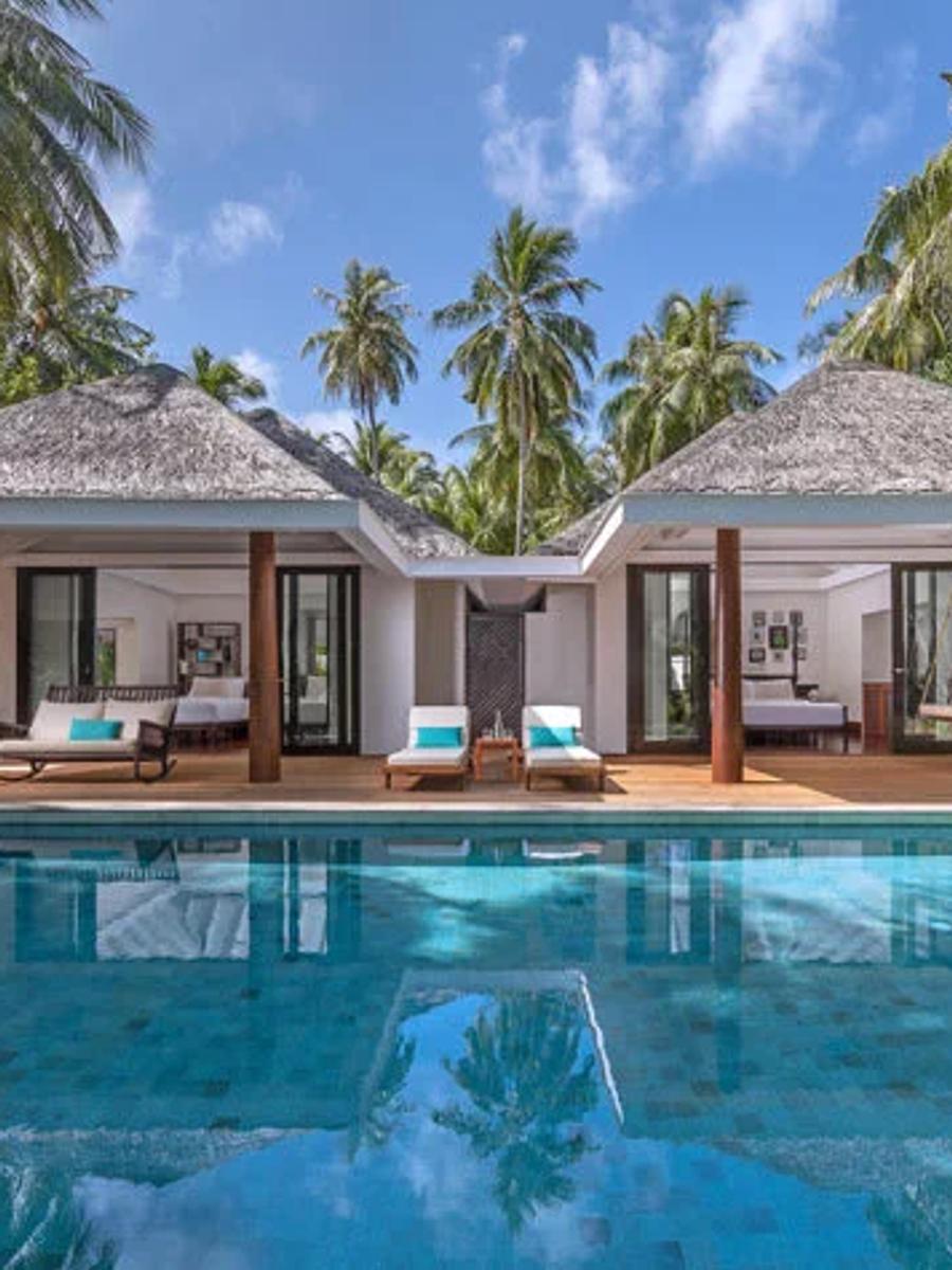 Exterior of a Two Bedroom Family Beach Pool Villa at Anantara Kihavah in daylight