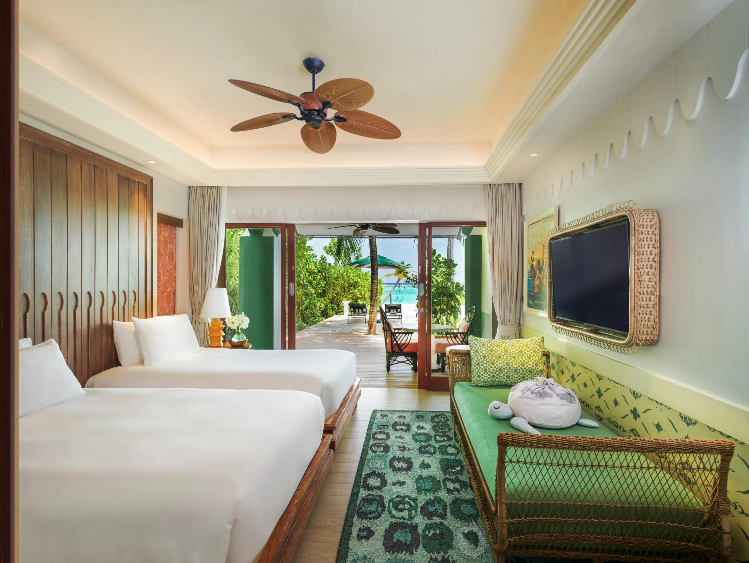 Bedroom interior of a Beach Room at SAii Lagoon Maldives
