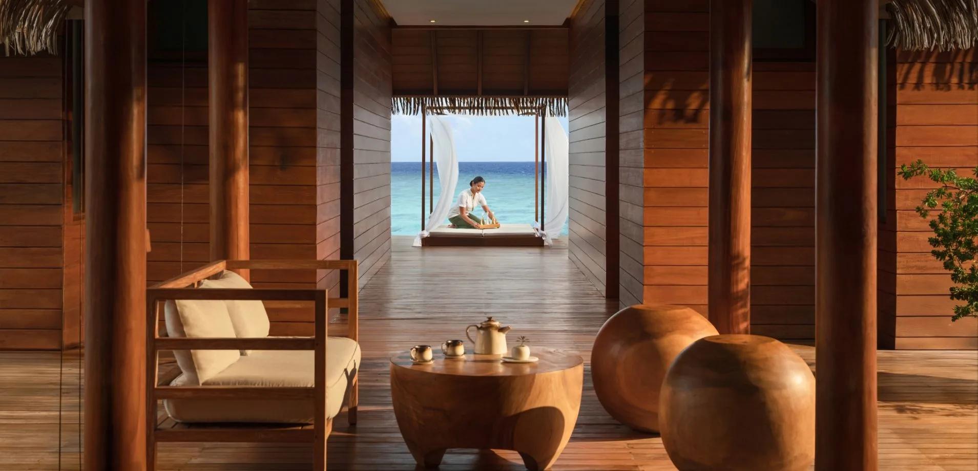 The overwater walkway leading to IASO Medi Spa's treatment deck, open to the lagoon