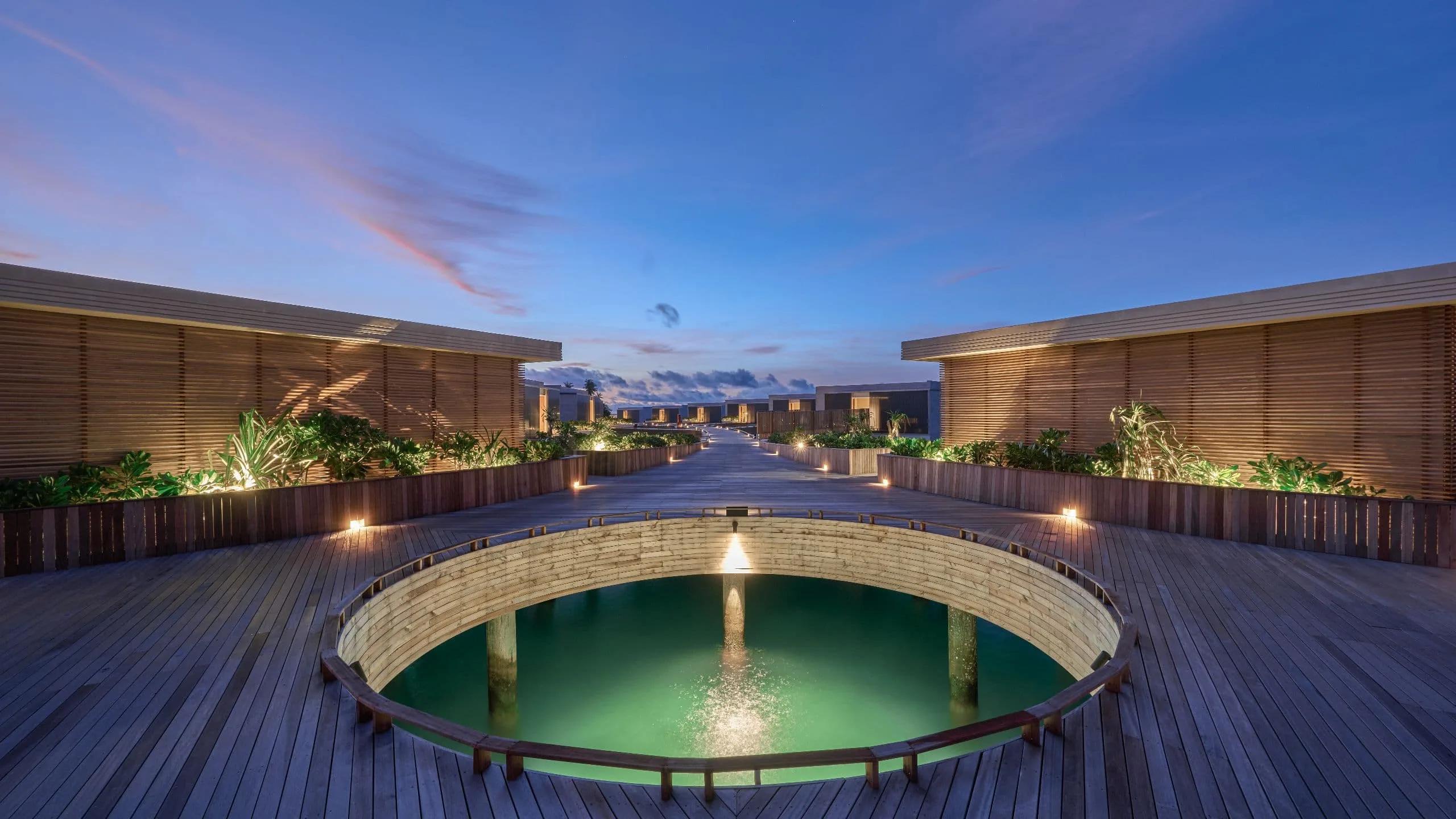 The jetty leading out to Alila Kothaifaru's overwater villas