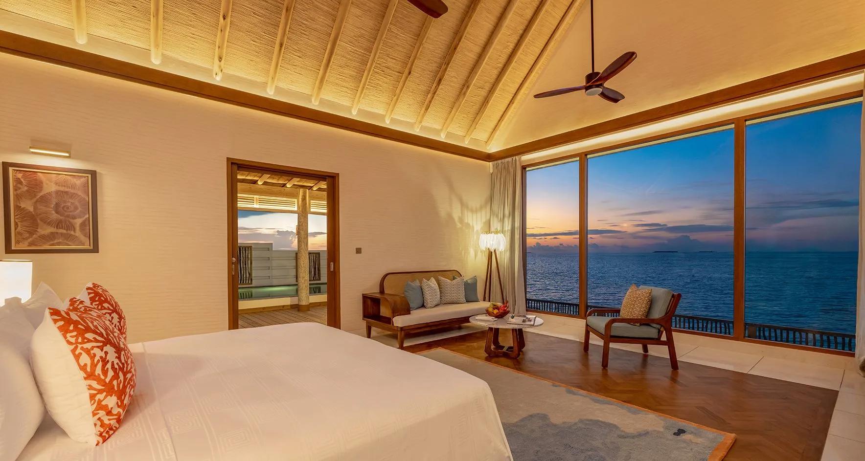 A Sunset Water Pool Villa with Slide at RAH GILI Maldives, overwater and facing the sunset side of the island