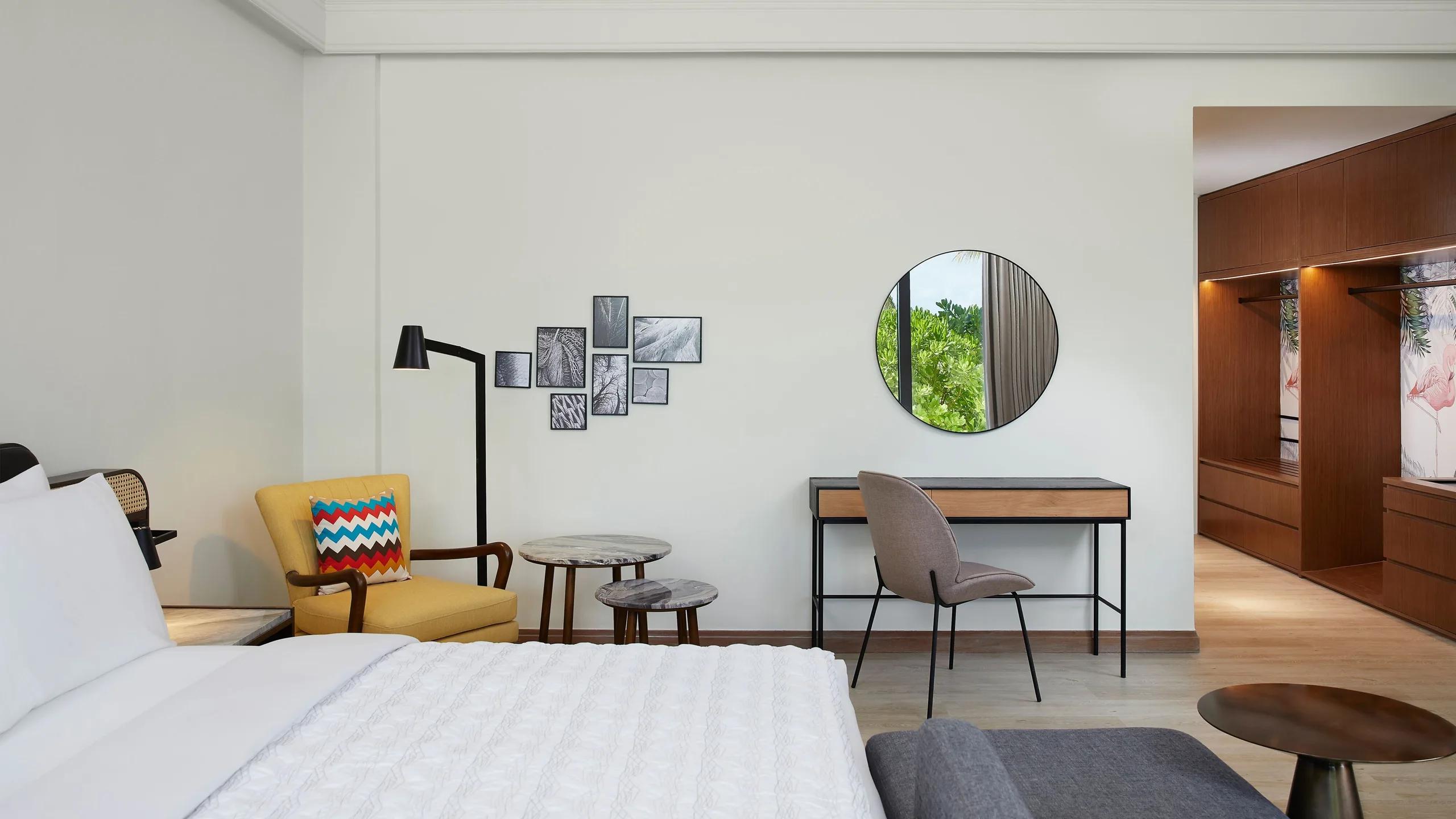 A bedroom inside the Thilamaafushi Villa, the resort's top villa category