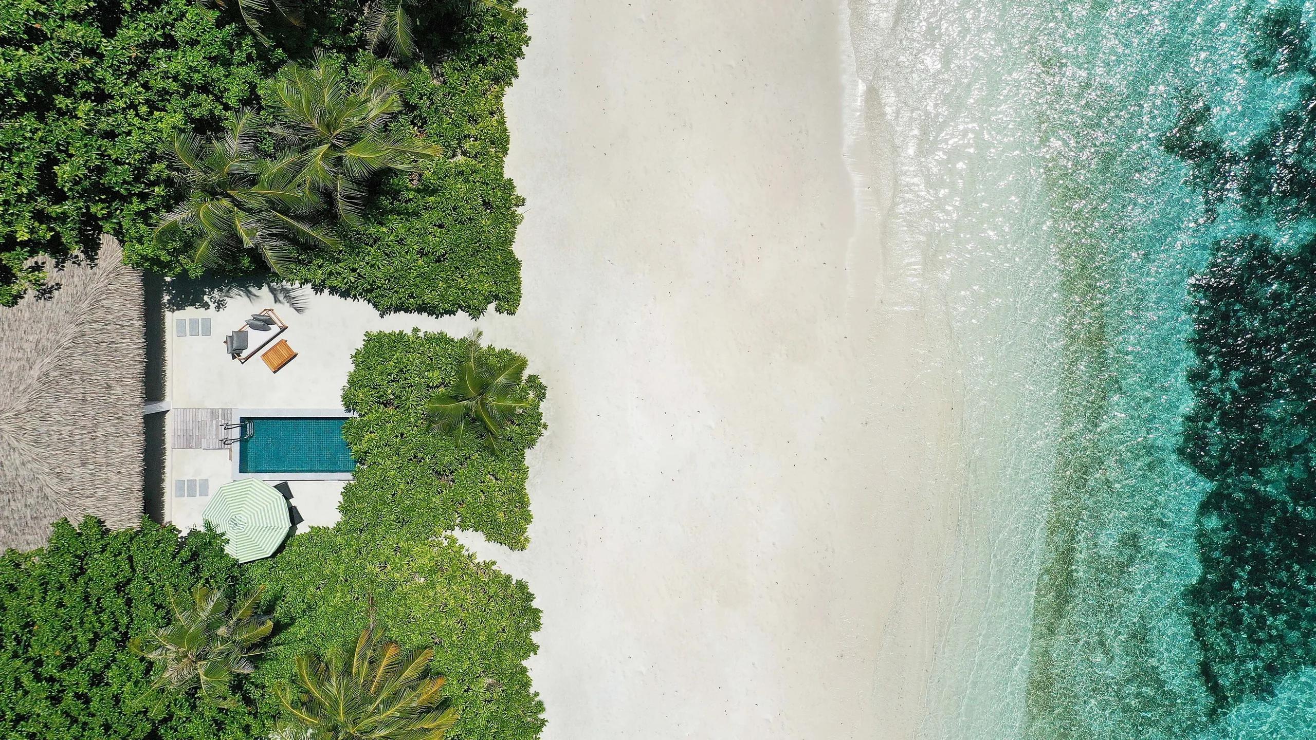 A beachfront pool villa deck at Le Méridien Maldives, representative of the Beach Pool Villa category — no dedicated Beach Pool Villa photograph exists in the source pool