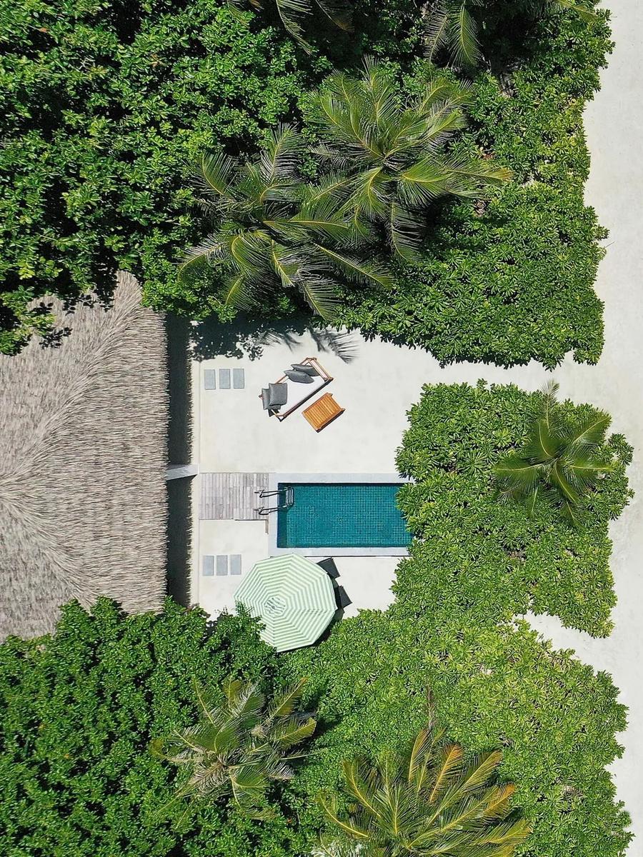 A beachfront pool villa deck at Le Méridien Maldives, representative of the Beach Pool Villa category — no dedicated Beach Pool Villa photograph exists in the source pool